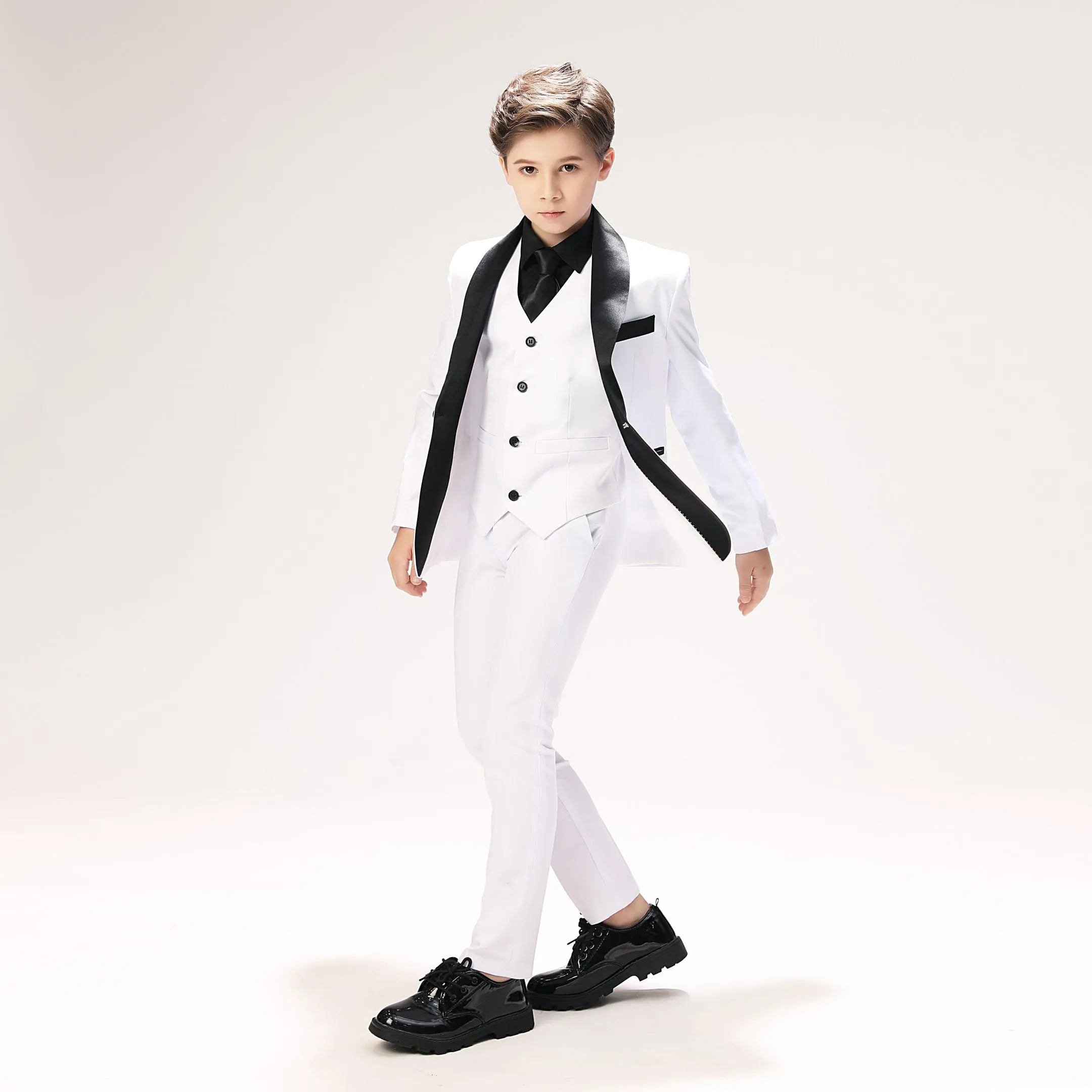 Stylish holiday boys suit 5-piece in white with black accents, perfect for special occasions