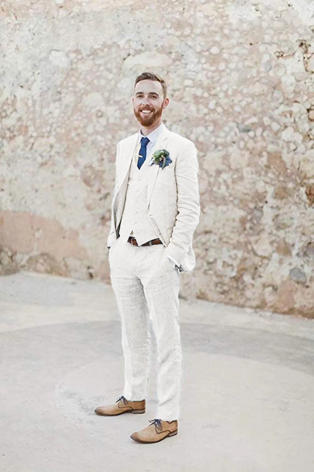 Full body view of men's white 3 piece linen suit – retro summer wedding outfit with blazer, vest, and tailored pants styled with brown shoes