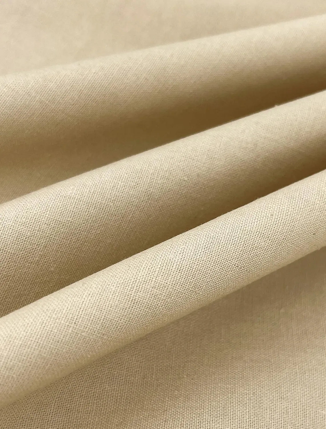 close-up of khaki linen fabric texture – breathable summer material for men's suits