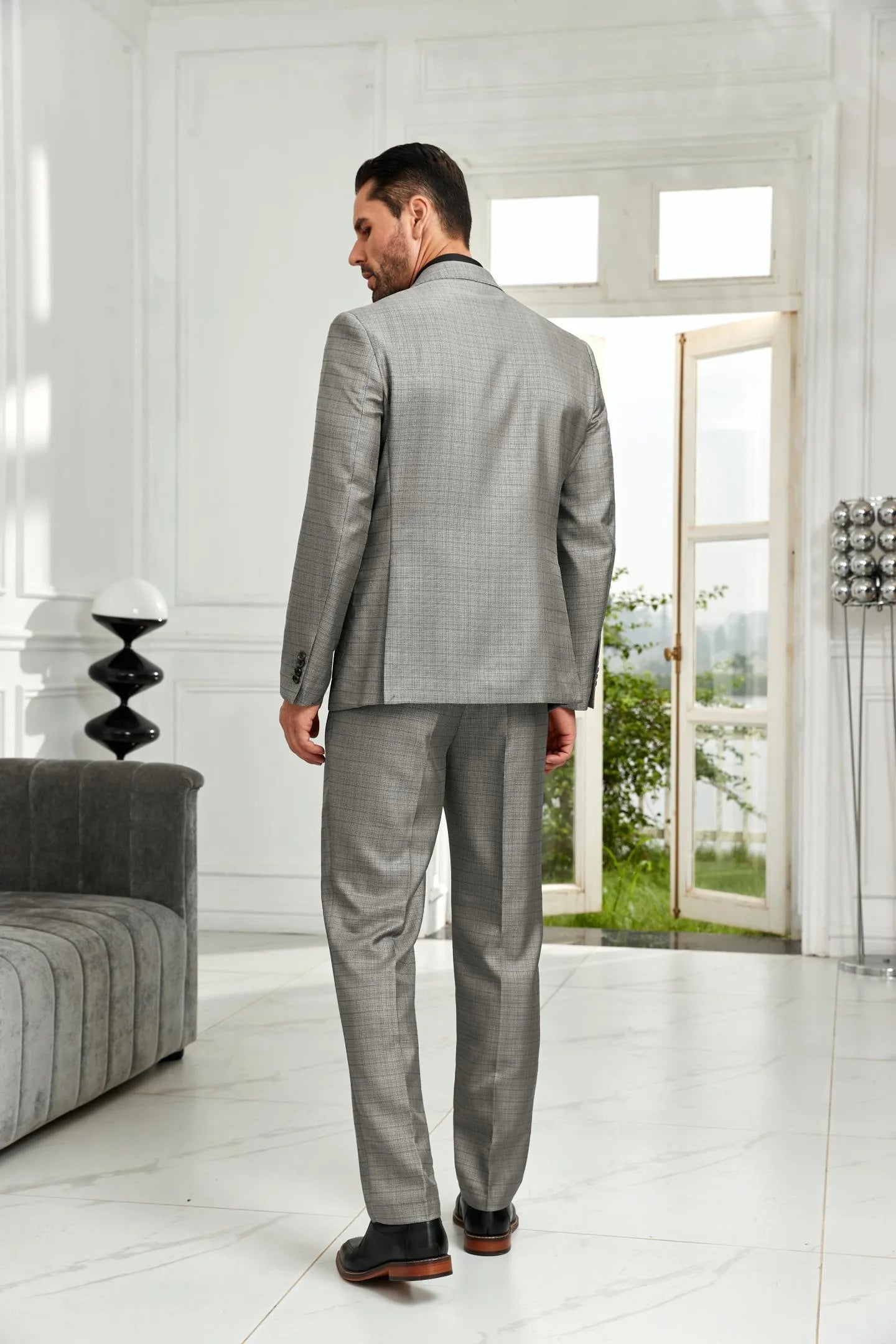 Back view of men's grey double breasted 2 piece suit – tailored blazer and trousers in formal office style