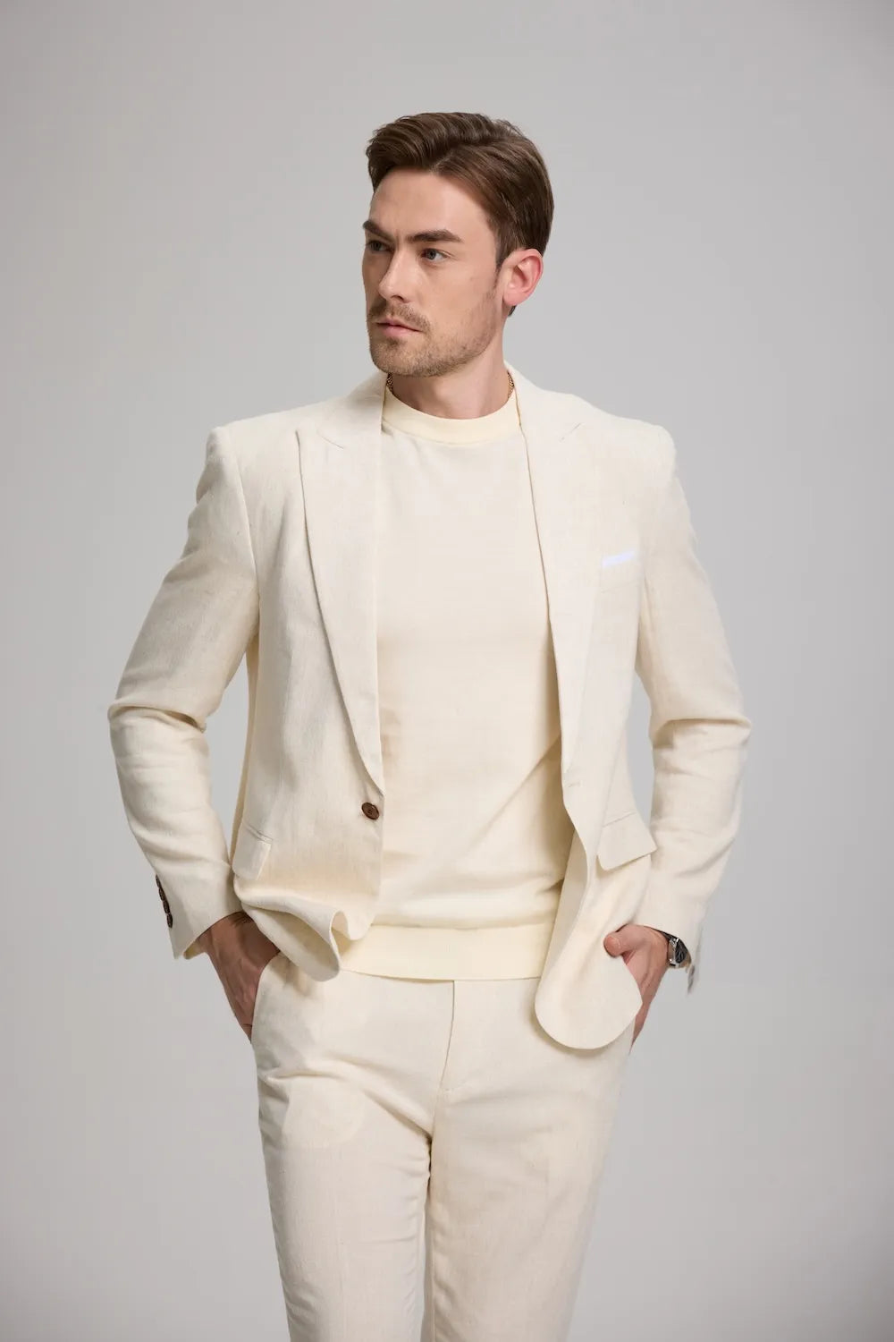 Front view of beige linen blazer and pants for men – paired with T-shirt for effortless summer look
