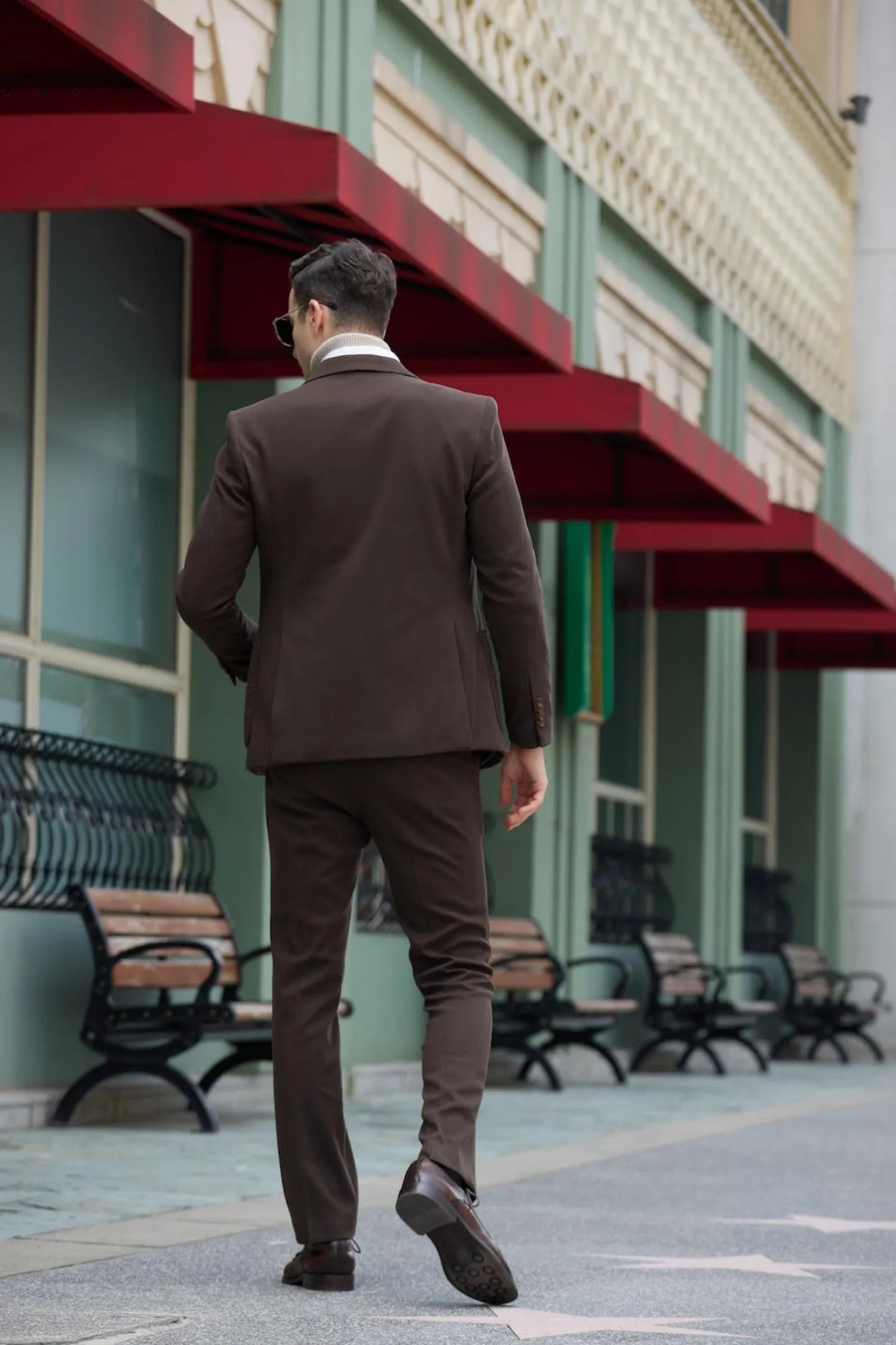 Back view of coffee herringbone tweed 2 piece men's suit, showing tailored fit double breasted blazer and trousers
