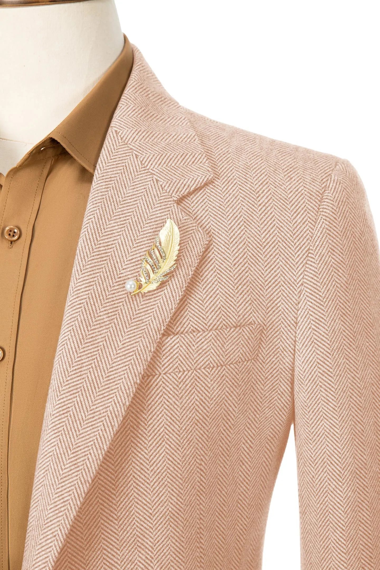 Close-up of the collar on men's orange herringbone business blazer – emphasizing fine details and craftsmanship