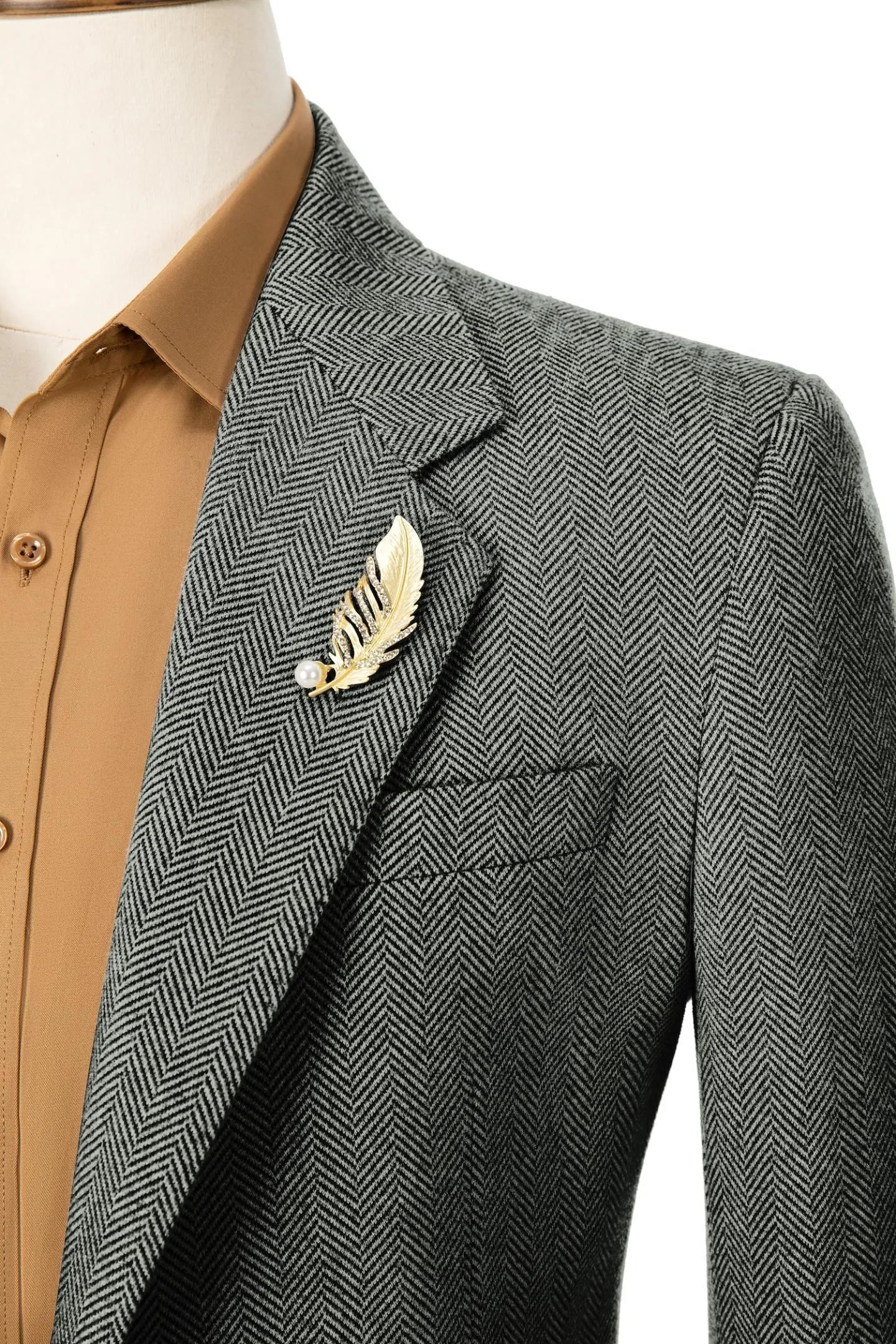 Close-up of tea herringbone business suit collar – showing classic styling and fine craftsmanship