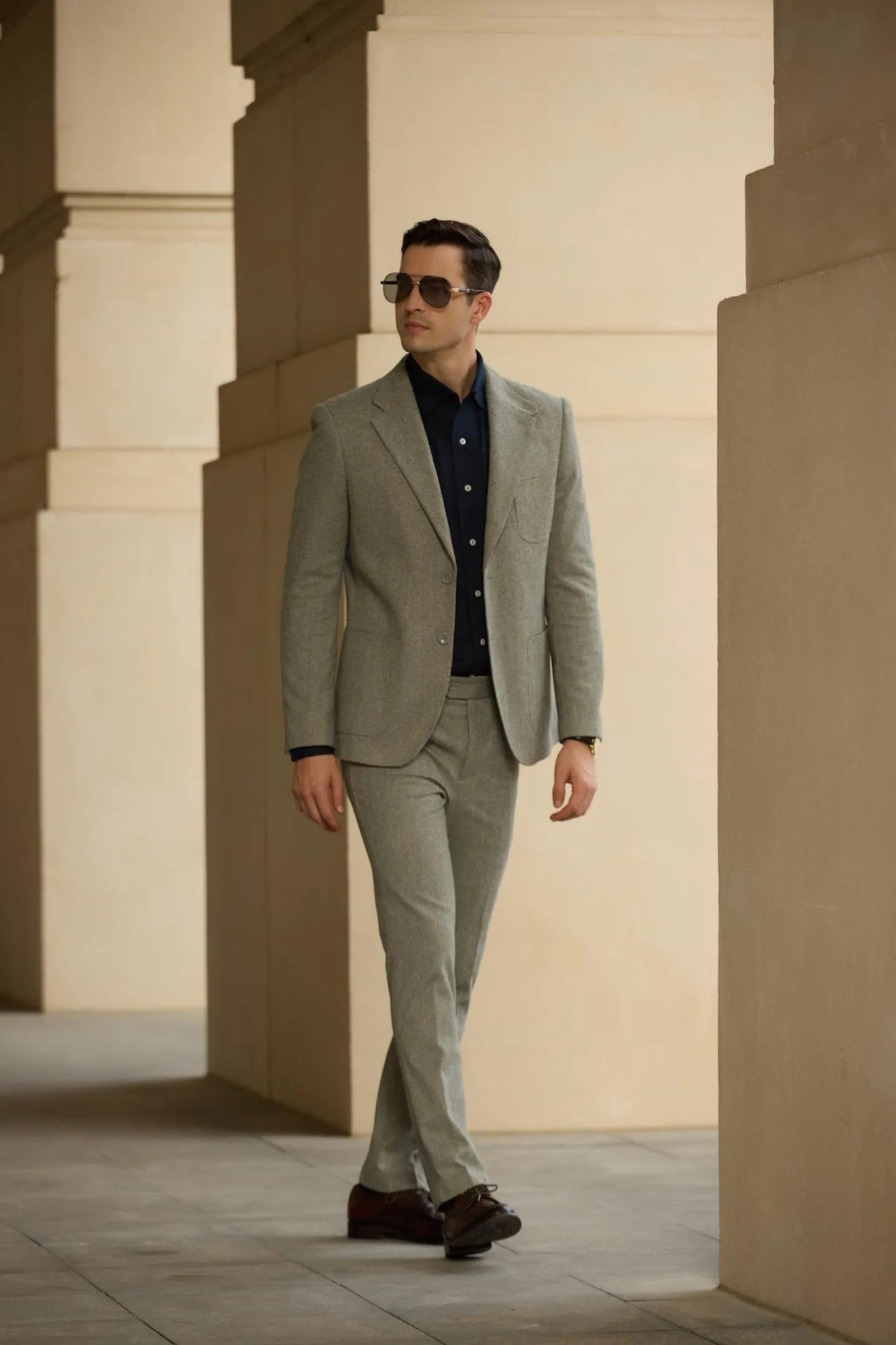 side view of grey wool herringbone 2 piece suit pants – showcasing tailored business fit for a professional look
