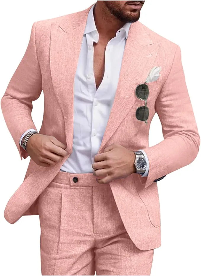 Man wearing pink slim fit linen 2 piece summer suit with peaked lapel blazer, styled with shirt for prom or casual summer occasions.