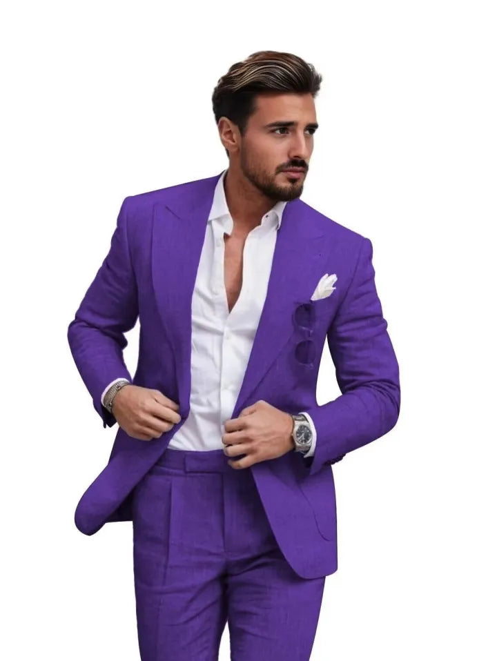 Man in purple slim fit linen 2 piece summer suit with peaked lapel blazer and trousers, styled with shirt for prom or weddings.