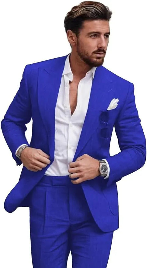 Front view of man wearing royal blue slim fit linen 2 piece summer suit with peaked lapel blazer and trousers.