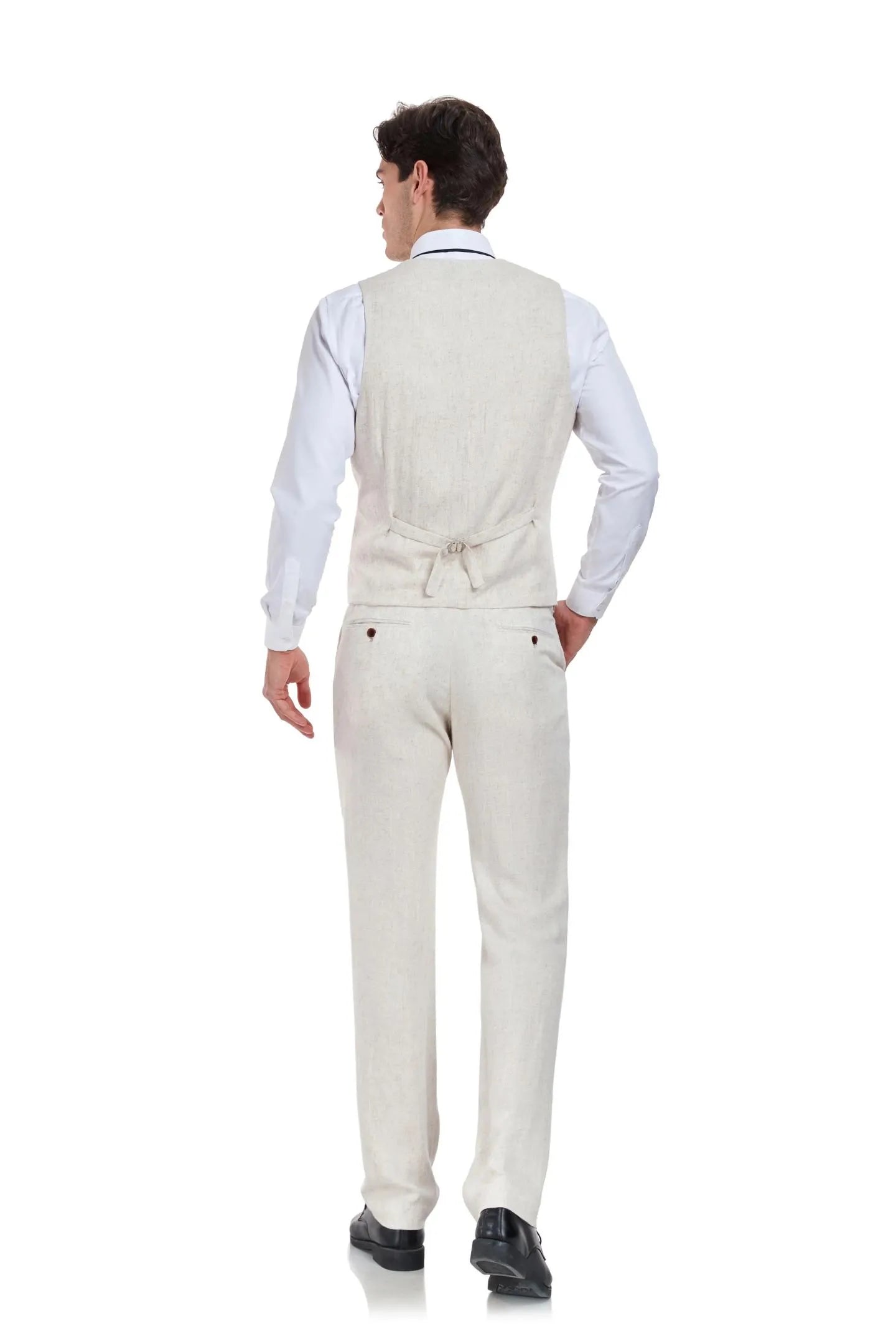 Back view of men’s beige linen 2 piece suit – tailored vest and slim fit trousers for summer