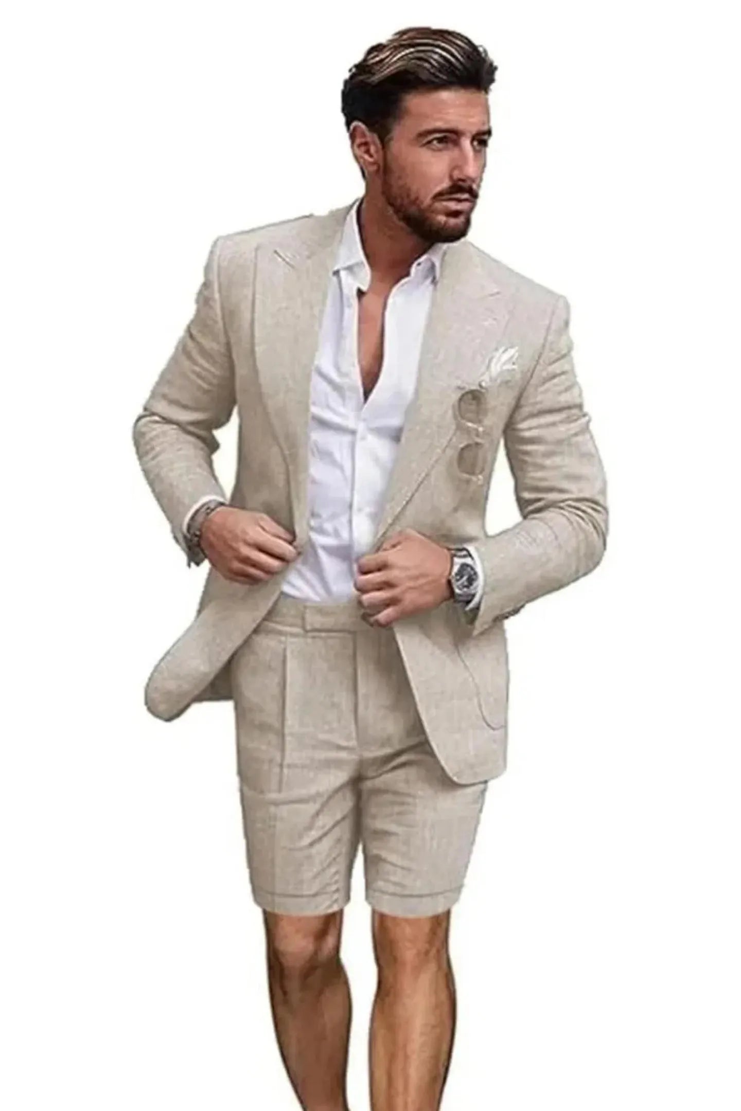 Front view of man in beige linen 2 piece short suit – slim fit peaked lapel blazer with shorts and white shirt for summer.