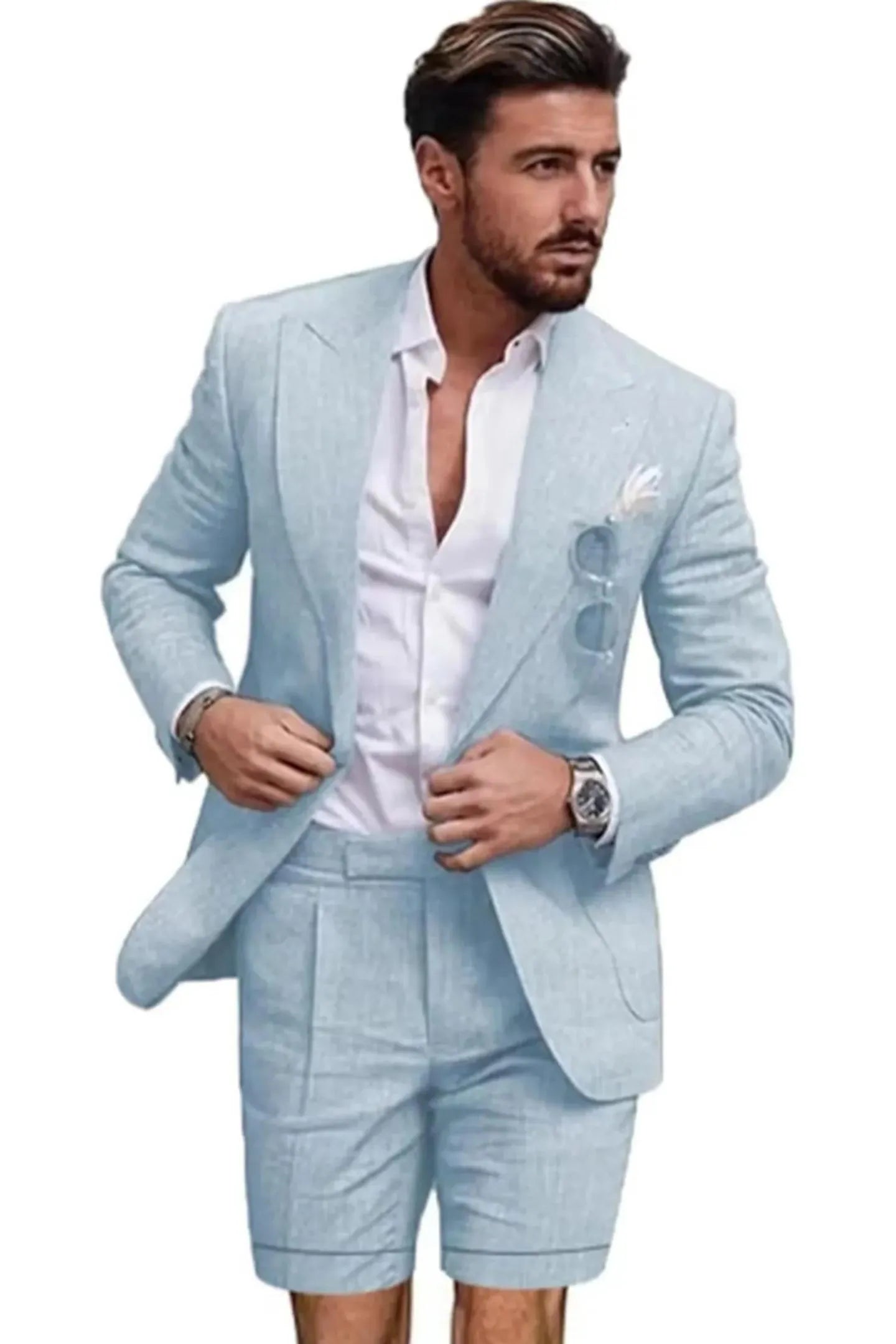 Front view of man in sky blue linen 2 piece short suit – slim fit peaked lapel blazer with shorts and white shirt for summer.