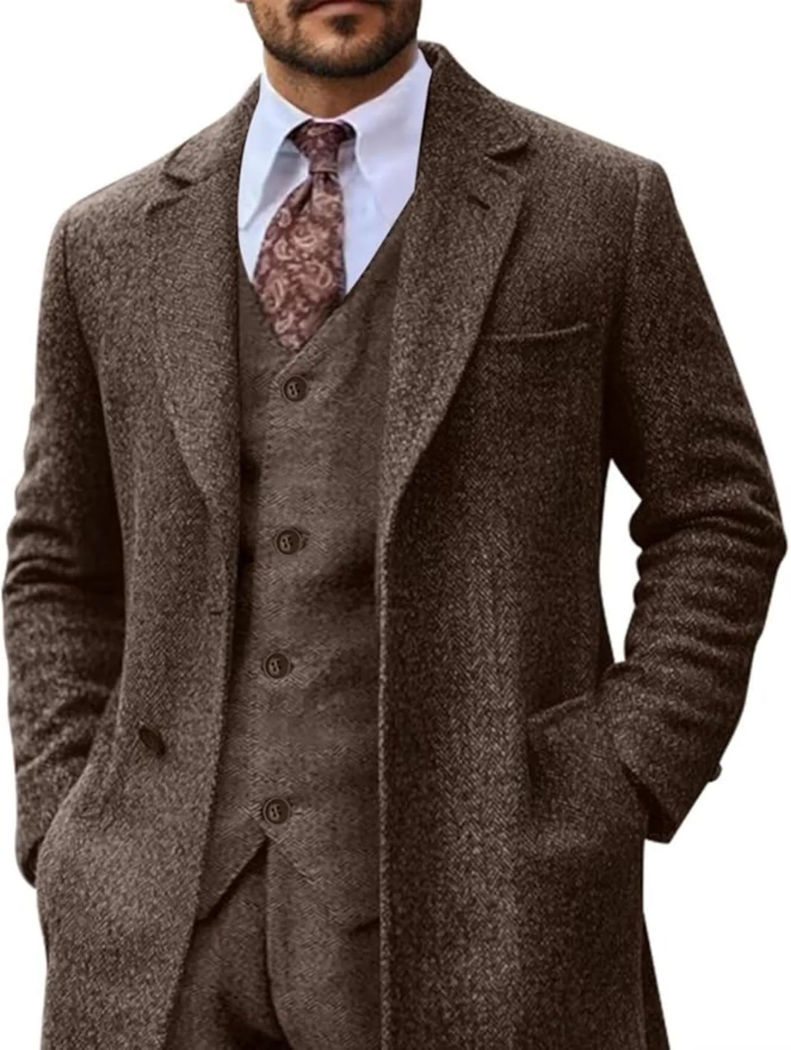 dark brown retro herringbone 3 piece suit with long blazer, paired with white shirt and patterned tie for a formal classic look.