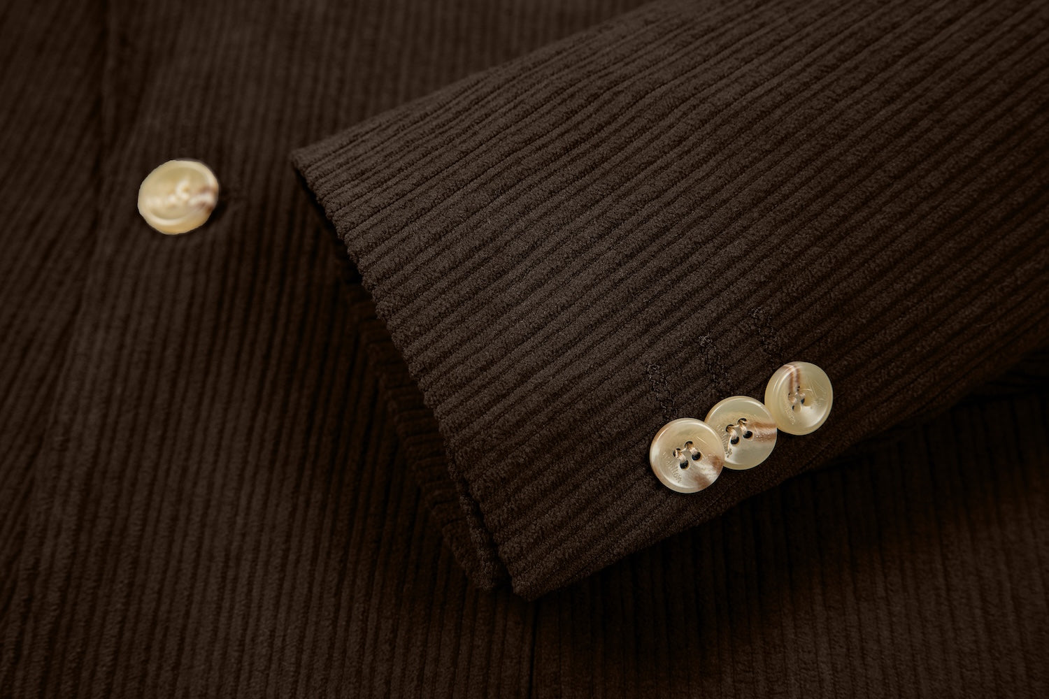 Cuff detail of dark coffee corduroy prom blazer – formal sleeve with neat finish