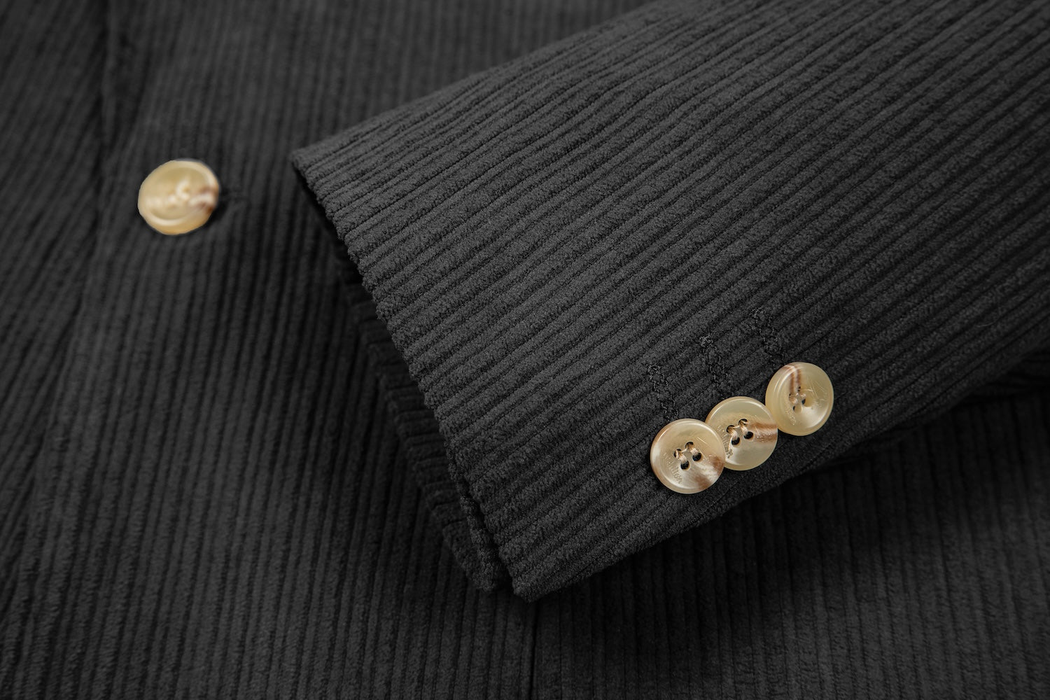 Cuff detail of dark grey corduroy prom blazer – formal sleeve with neat finish