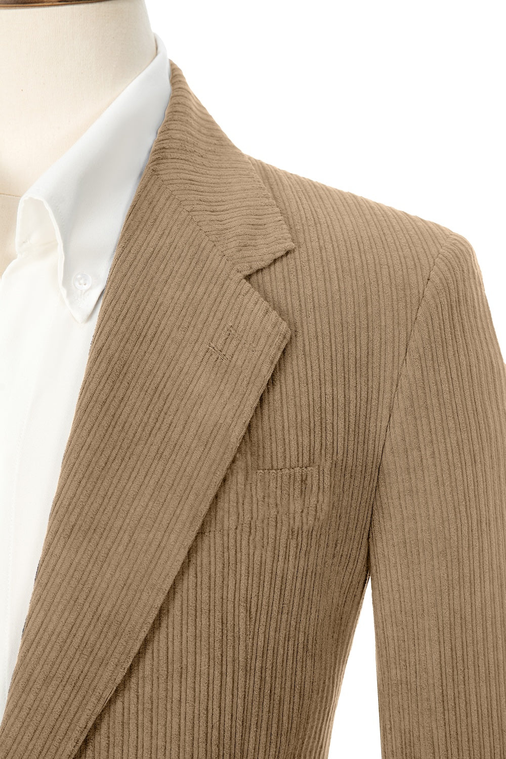 Close-up of khaki corduroy prom blazer lapel – textured fabric, elegant cut