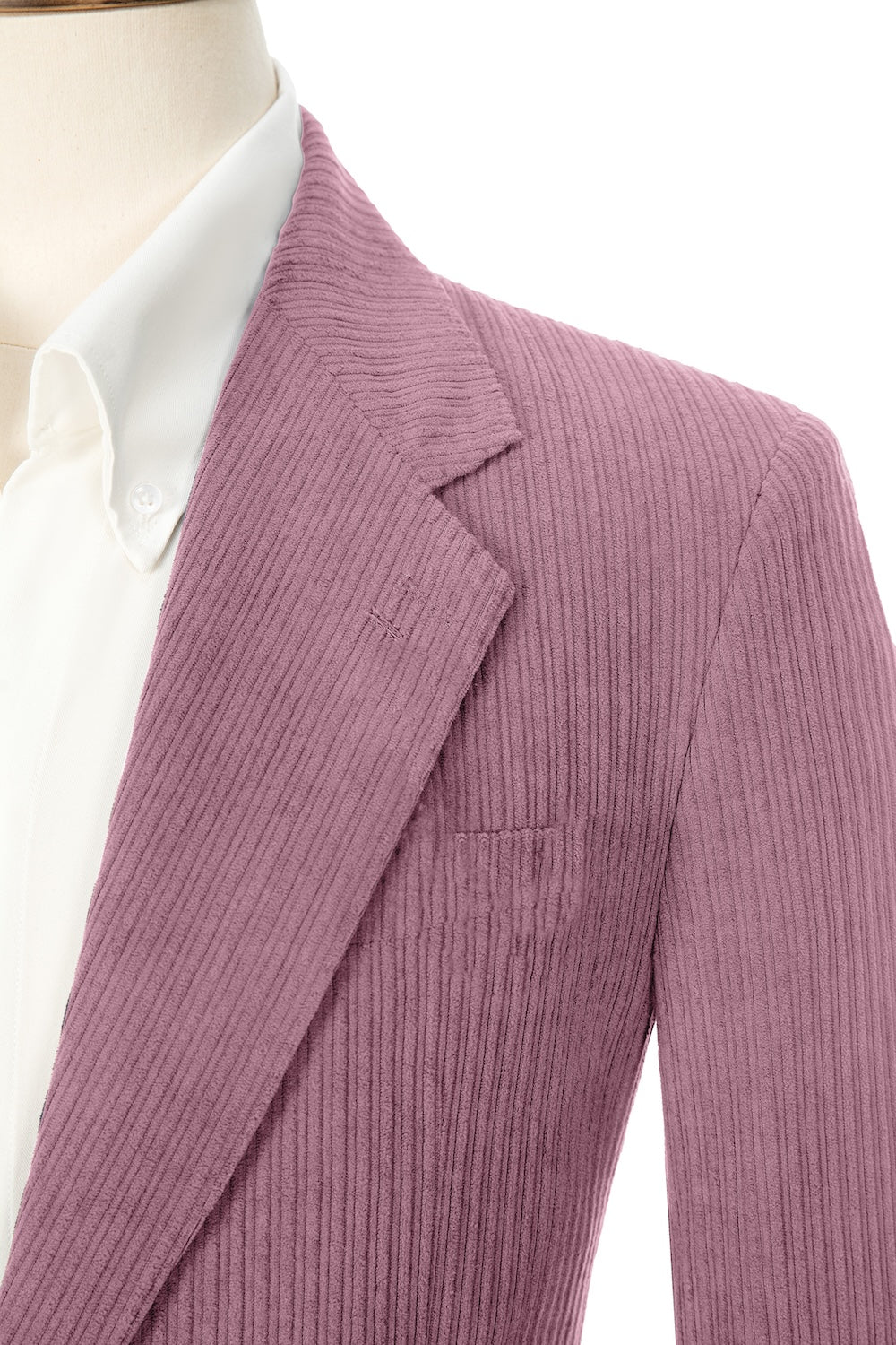 Close-up of leather pink corduroy prom blazer lapel – textured fabric, elegant cut