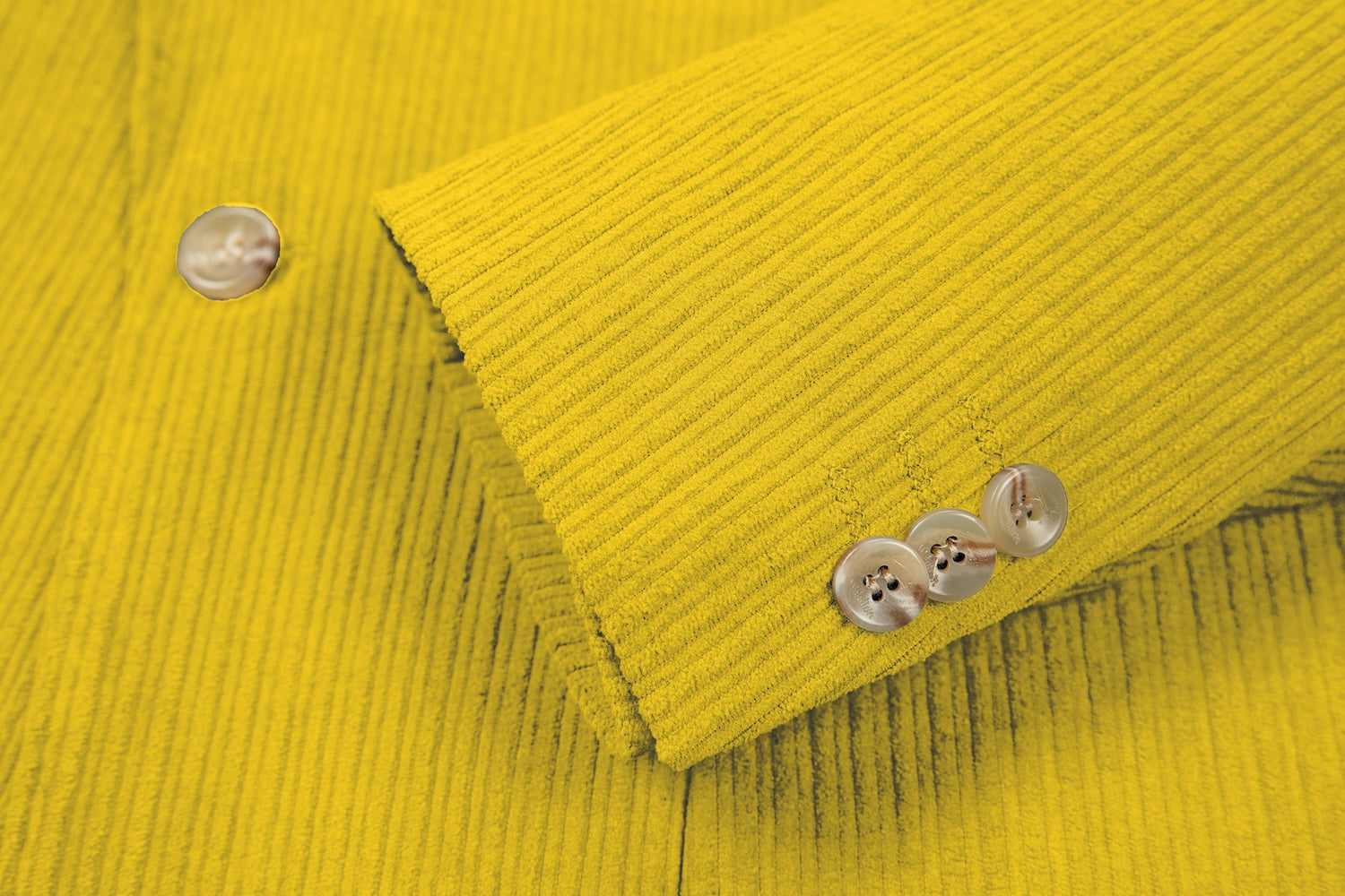 Cuff detail of yellow corduroy prom blazer – formal sleeve with neat finish