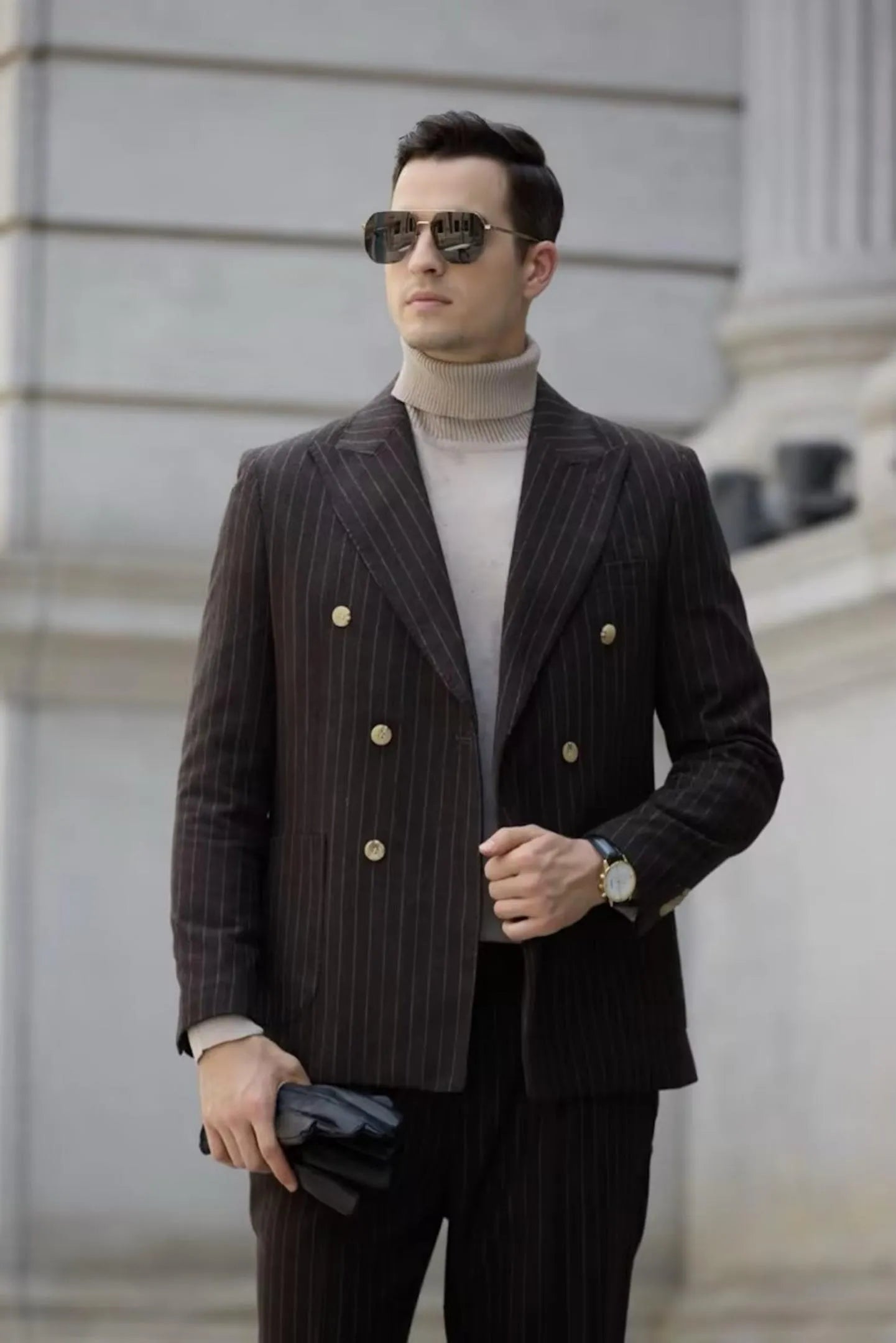Men's coffee herringbone chalk stripe double-breasted suit – close-up of blazer details, including the golden buttons and fine pinstripe pattern.