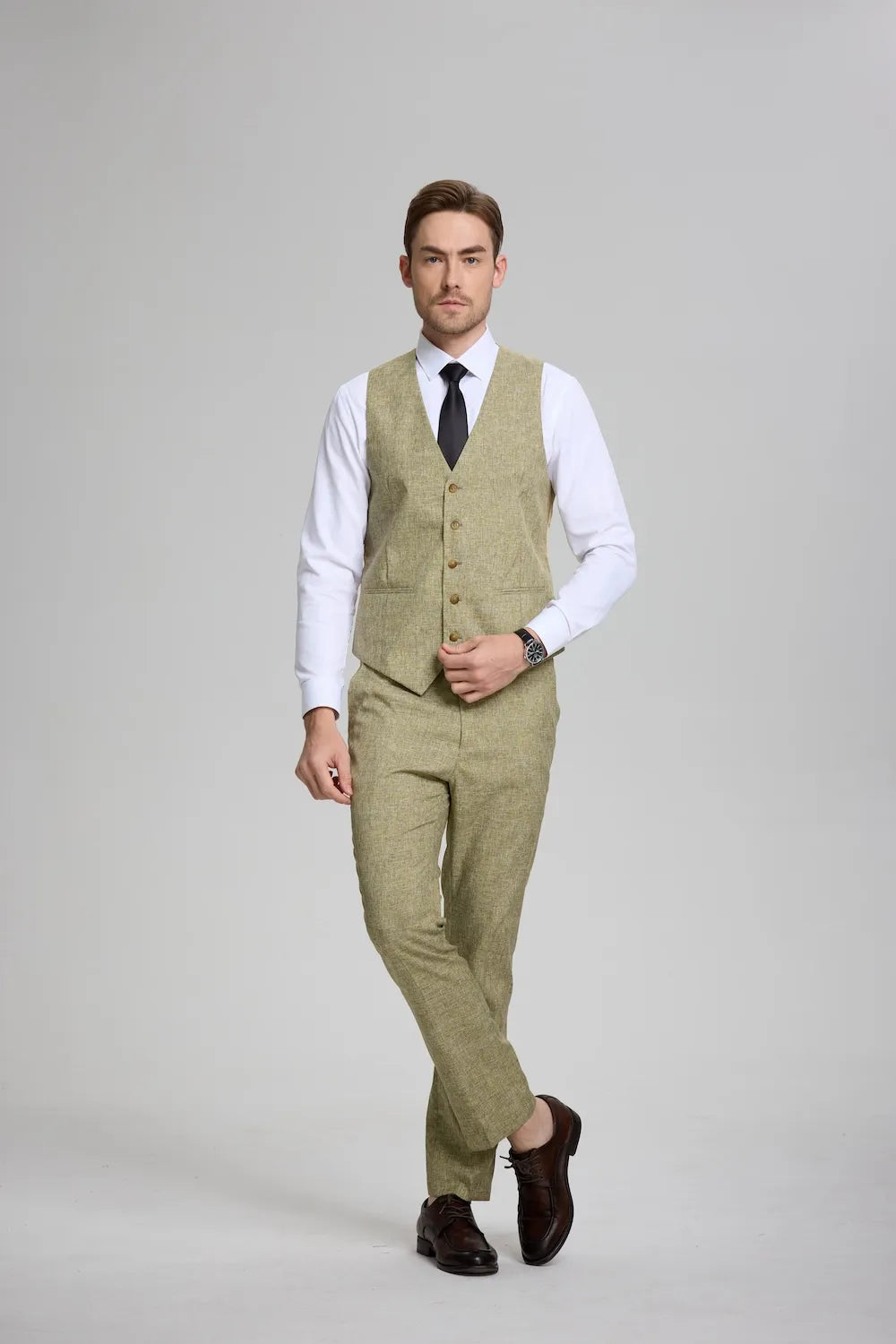 men's green 3-piece suit – walking pose with blazer and trousers – stylish for casual or formal gatherings