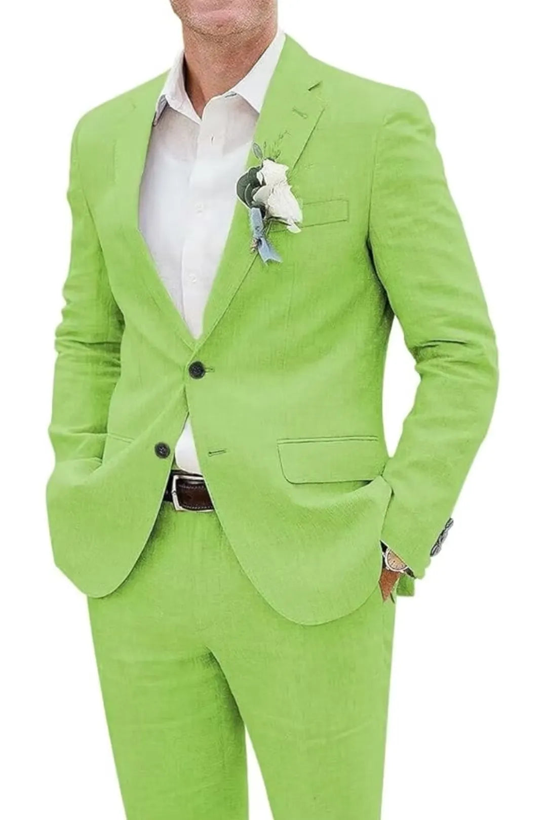 Close-up of sage green slim fit linen suit jacket with boutonniere and dress shirt – summer wedding style.