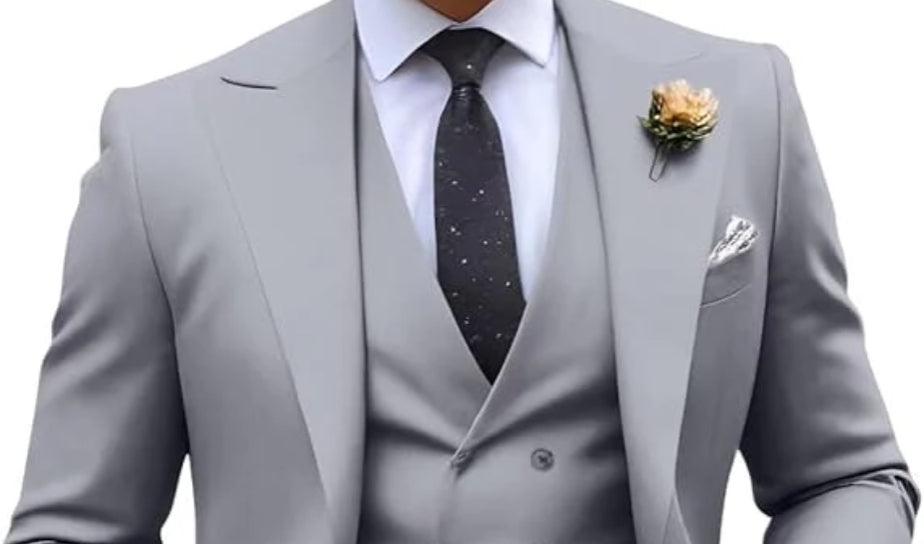 Stylish grey suits for men featuring a tailored fit and elegant accessories