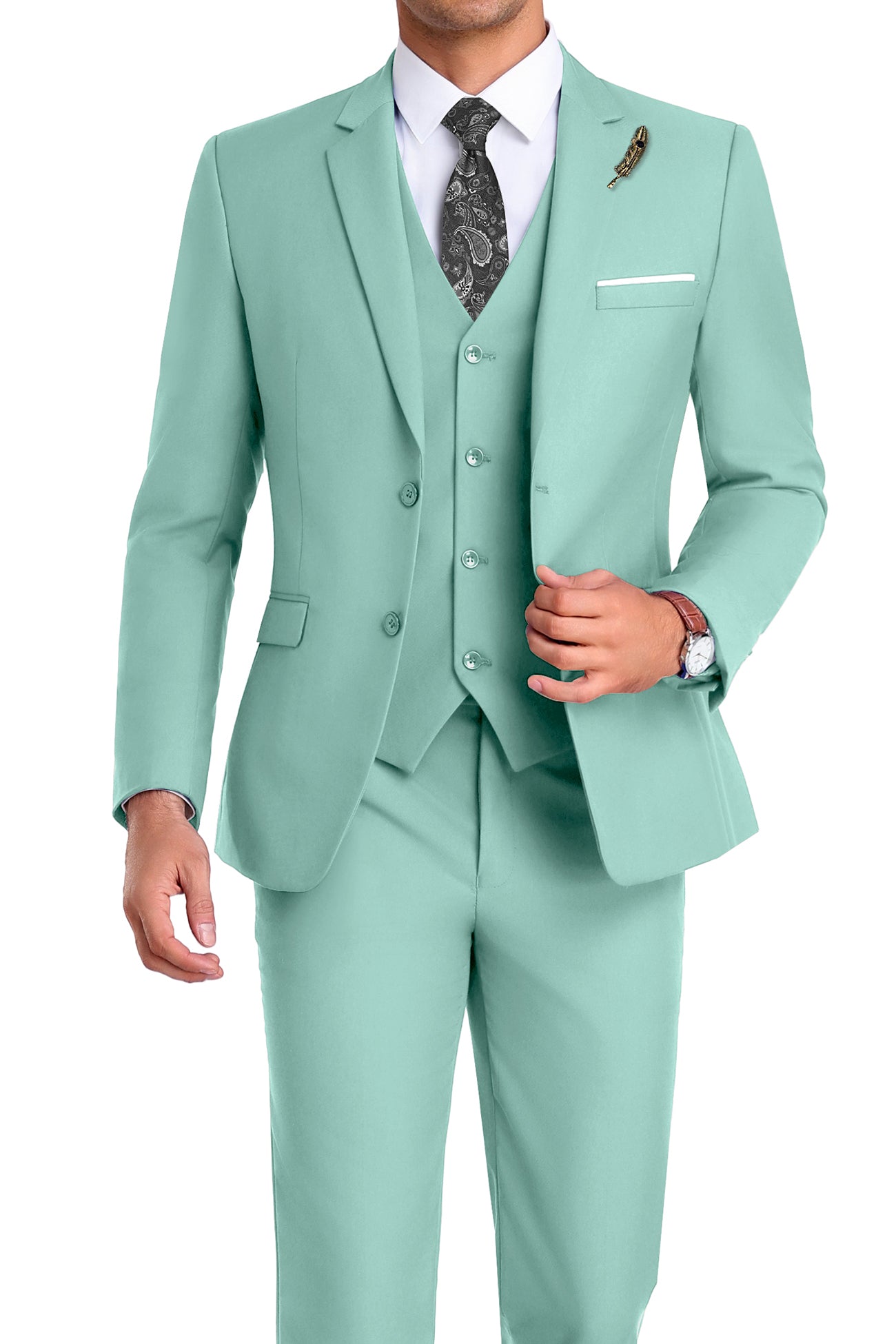 Model in mint green 3-piece slim fit suit with tie and white shirt, posing front-facing with confident posture