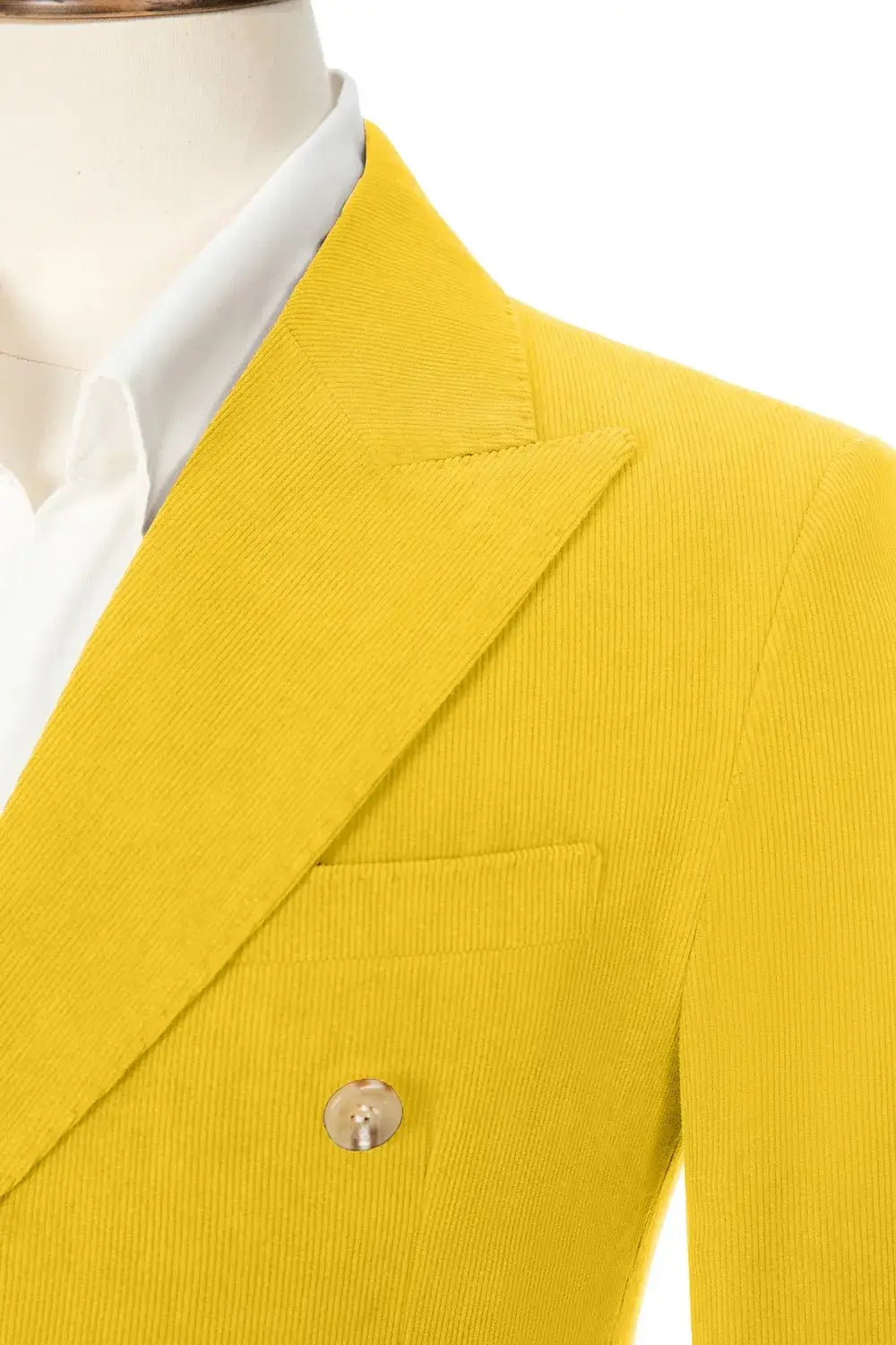 Close-up of yellow corduroy blazer lapel – peak lapel and fine texture