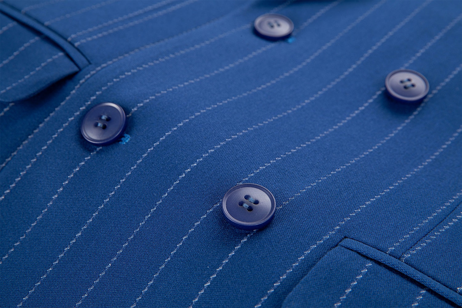 Flap pocket detail on royal blue chalk stripe men's suit jacket