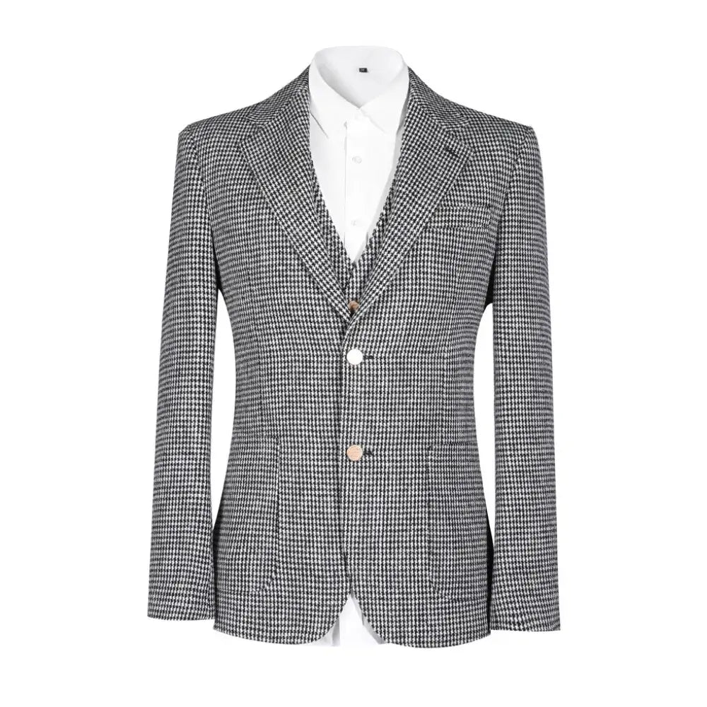 Front view of houndstooth peak lapel 3 piece men's suit with white shirt