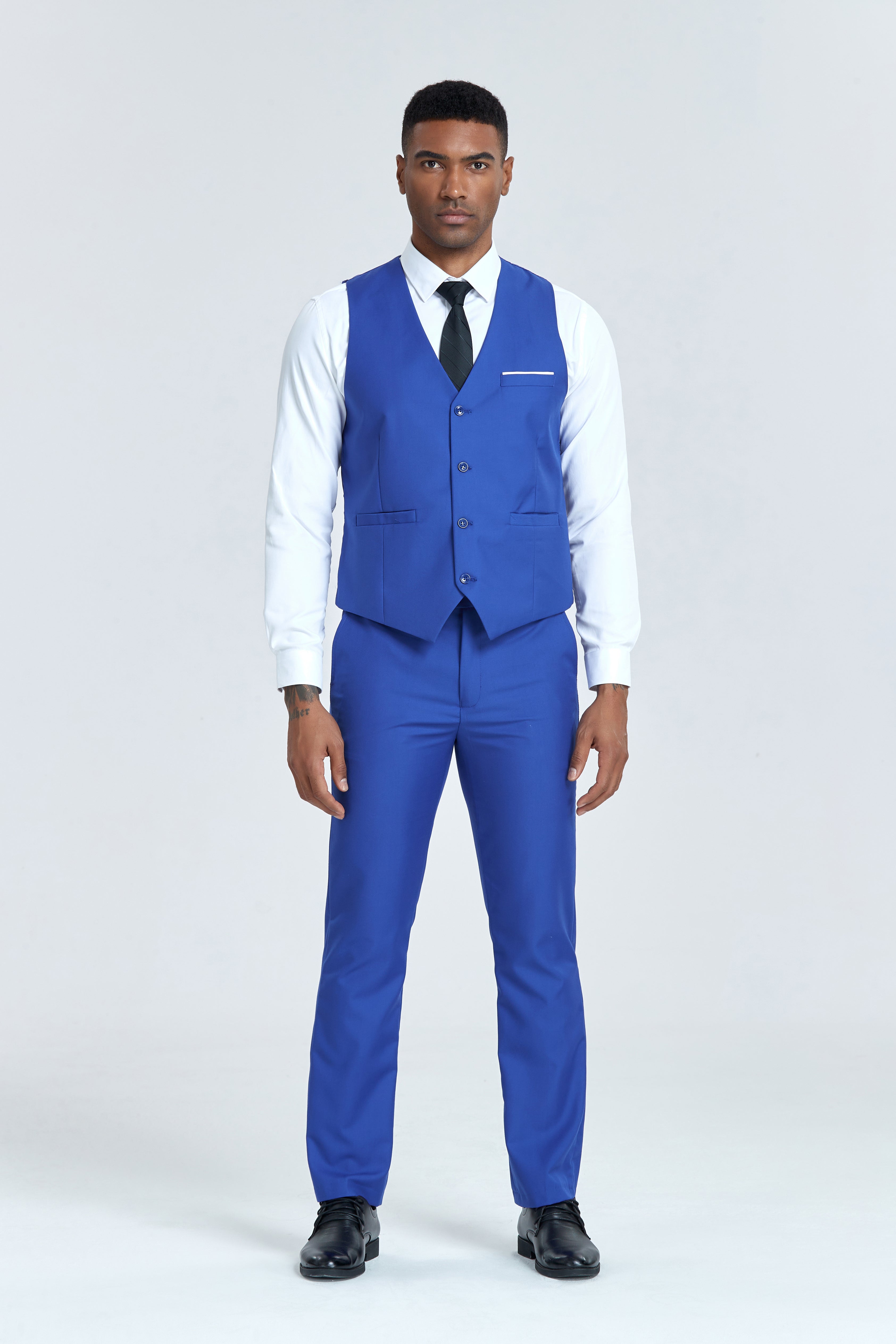 Royal blue vest suit with white shirt and black tie, sharp and polished
