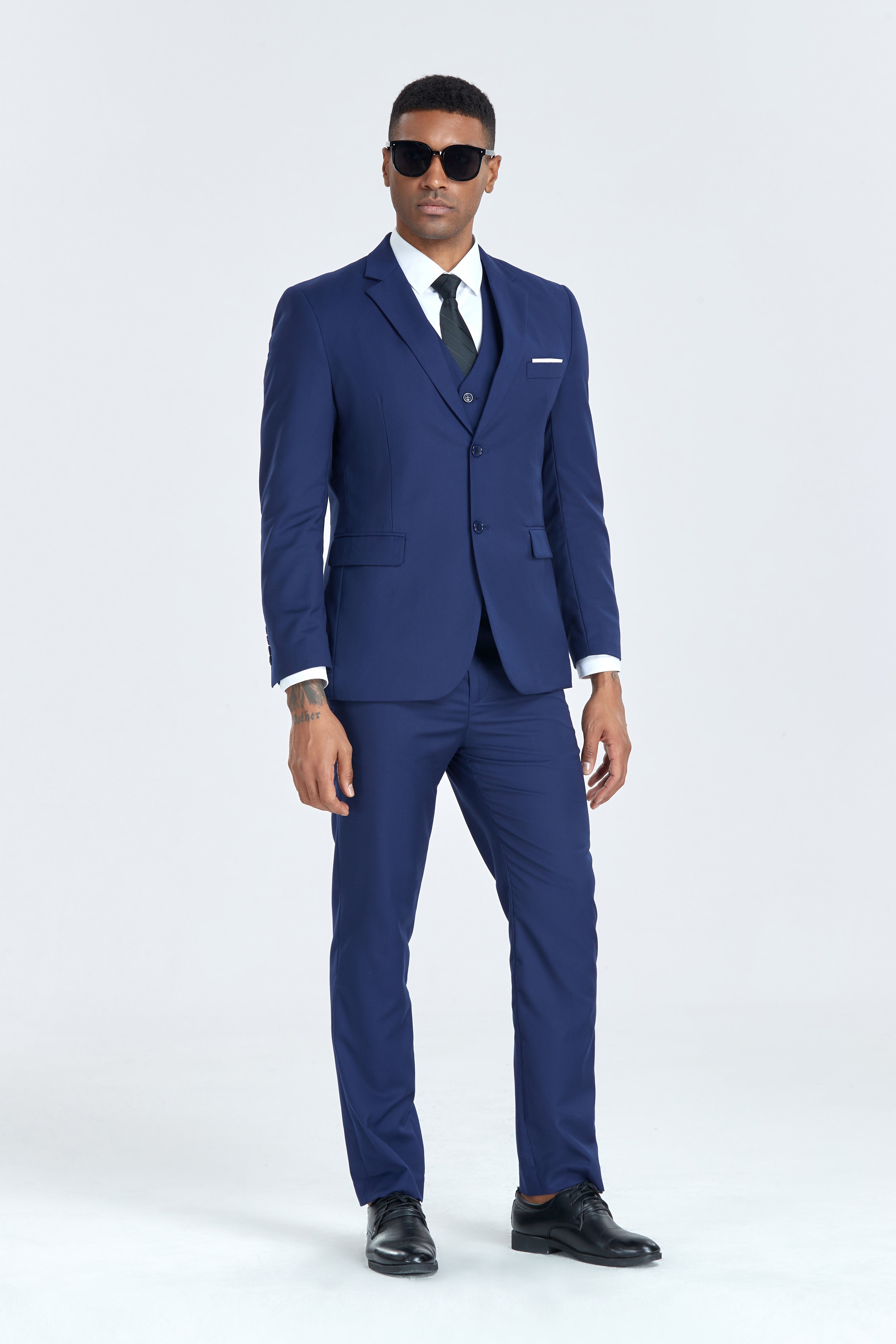 Formal navy 3 piece suit with sunglasses, ideal for business or banquet