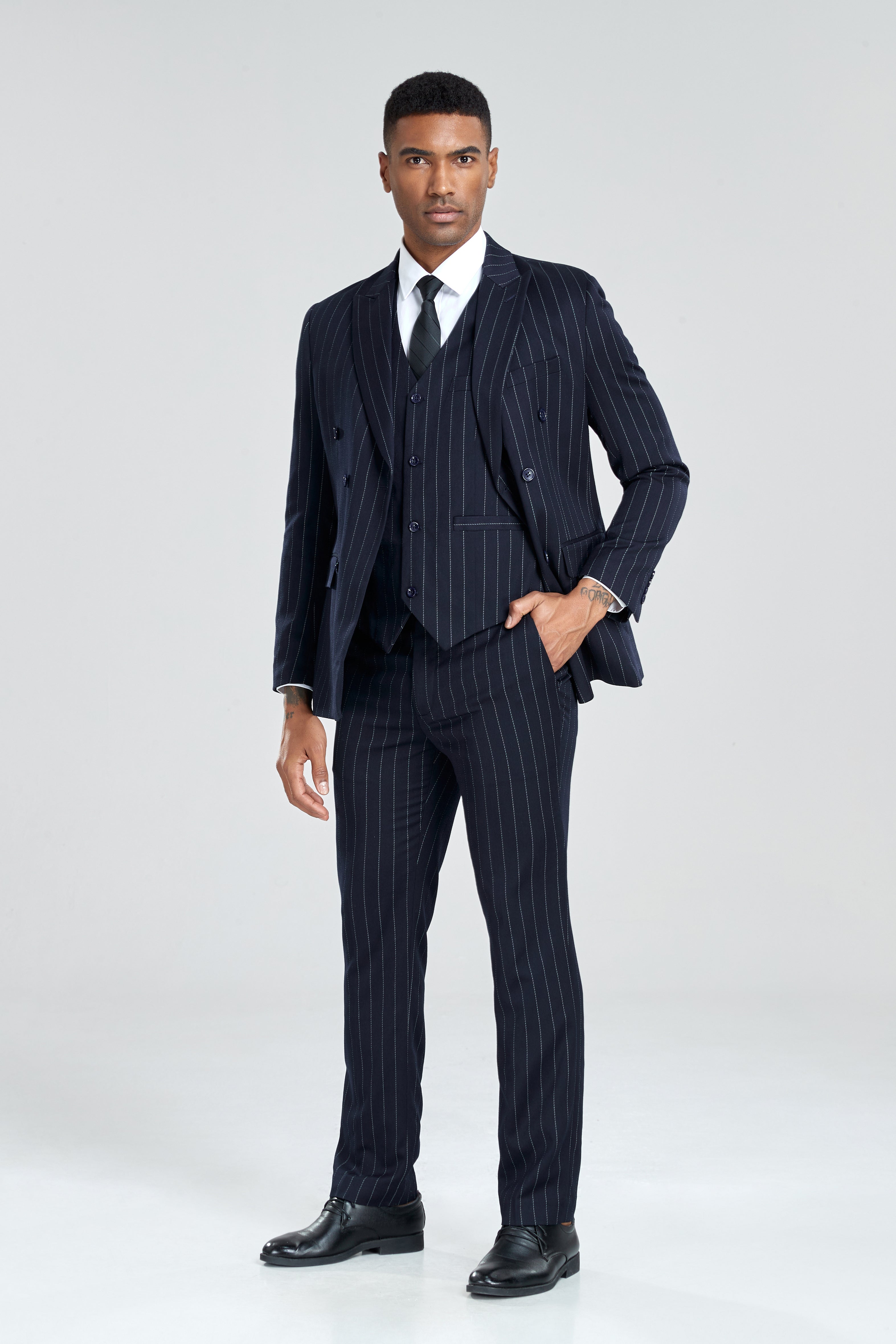 Tailored men's navy bold stripe 3 piece suit with peak lapel and business-ready fit