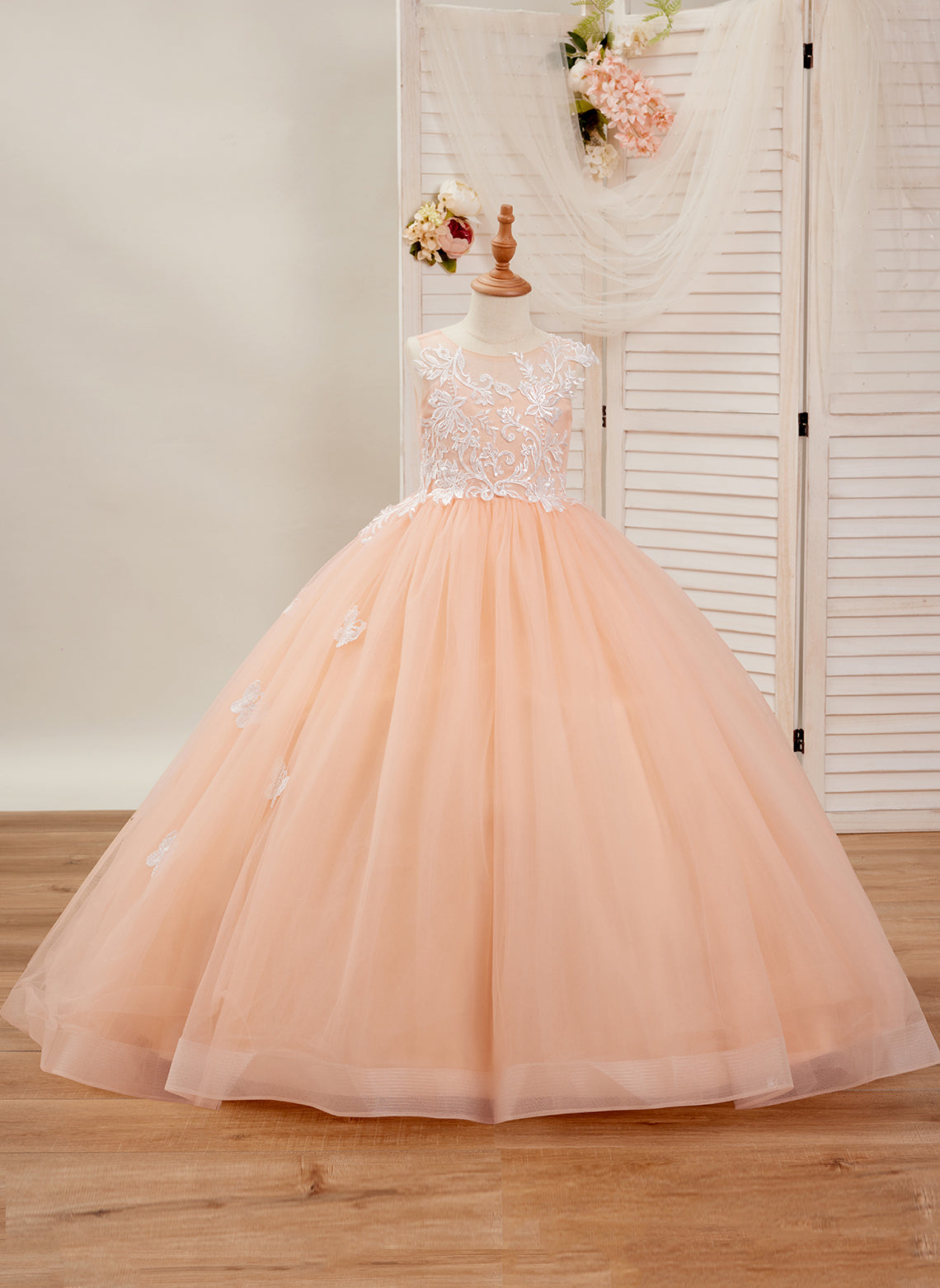 Wehilion applique tulle princess gown in peach with floral details for special occasions