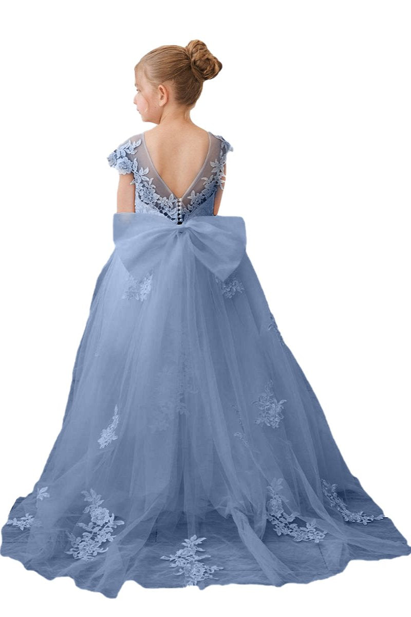 Wehilion flower girl tulle dress in blue with lace detailing and a large bow at the back