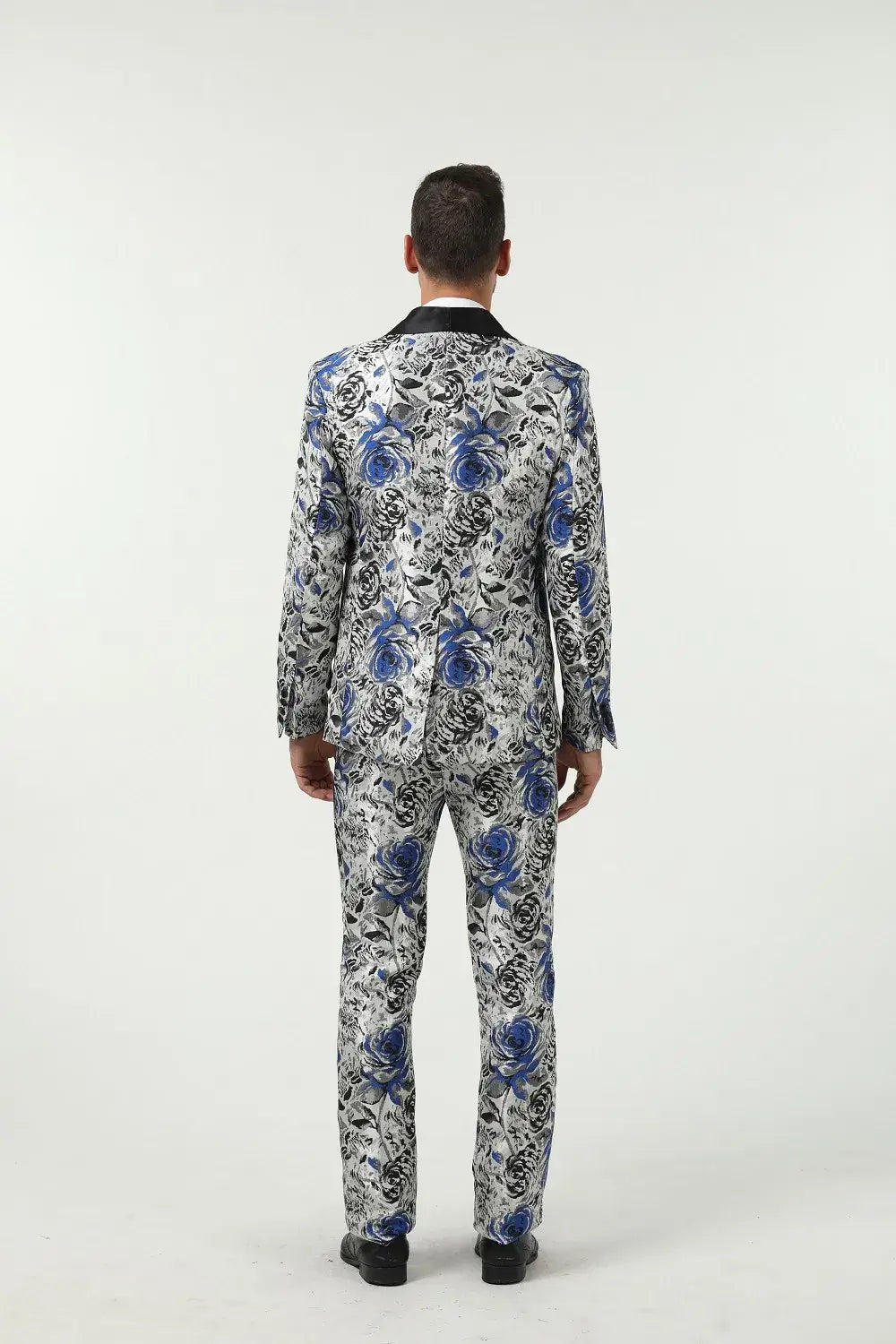 Back view of men's blue floral suit 3 piece with patterned fabric – bold fashion-forward style
