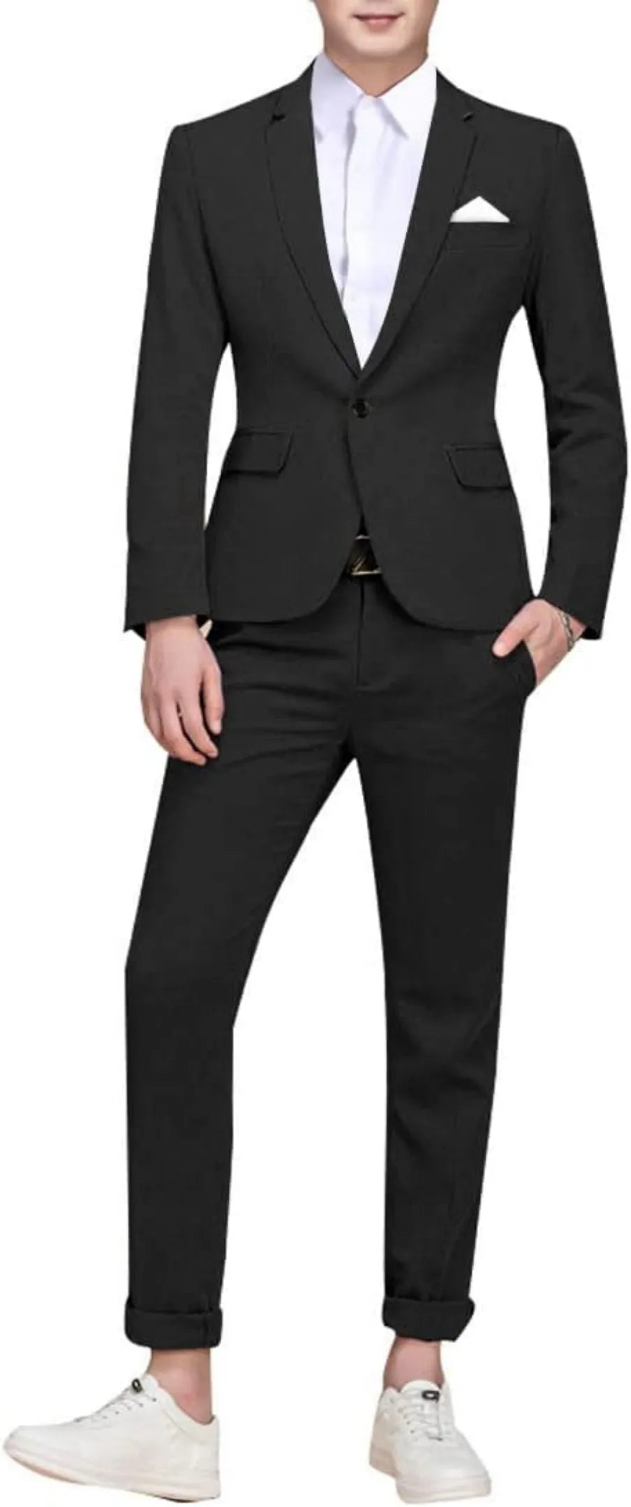 model wearing a black single-breasted one button suit, paired with a white shirt and sneakers for a modern casual-formal look.