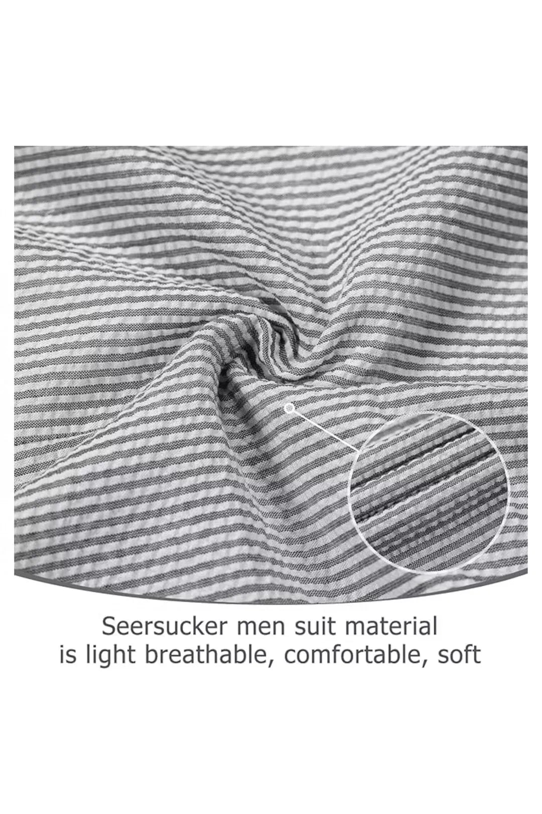 Close-up of lightweight black-and-white seersucker fabric texture with soft puckered stripes.