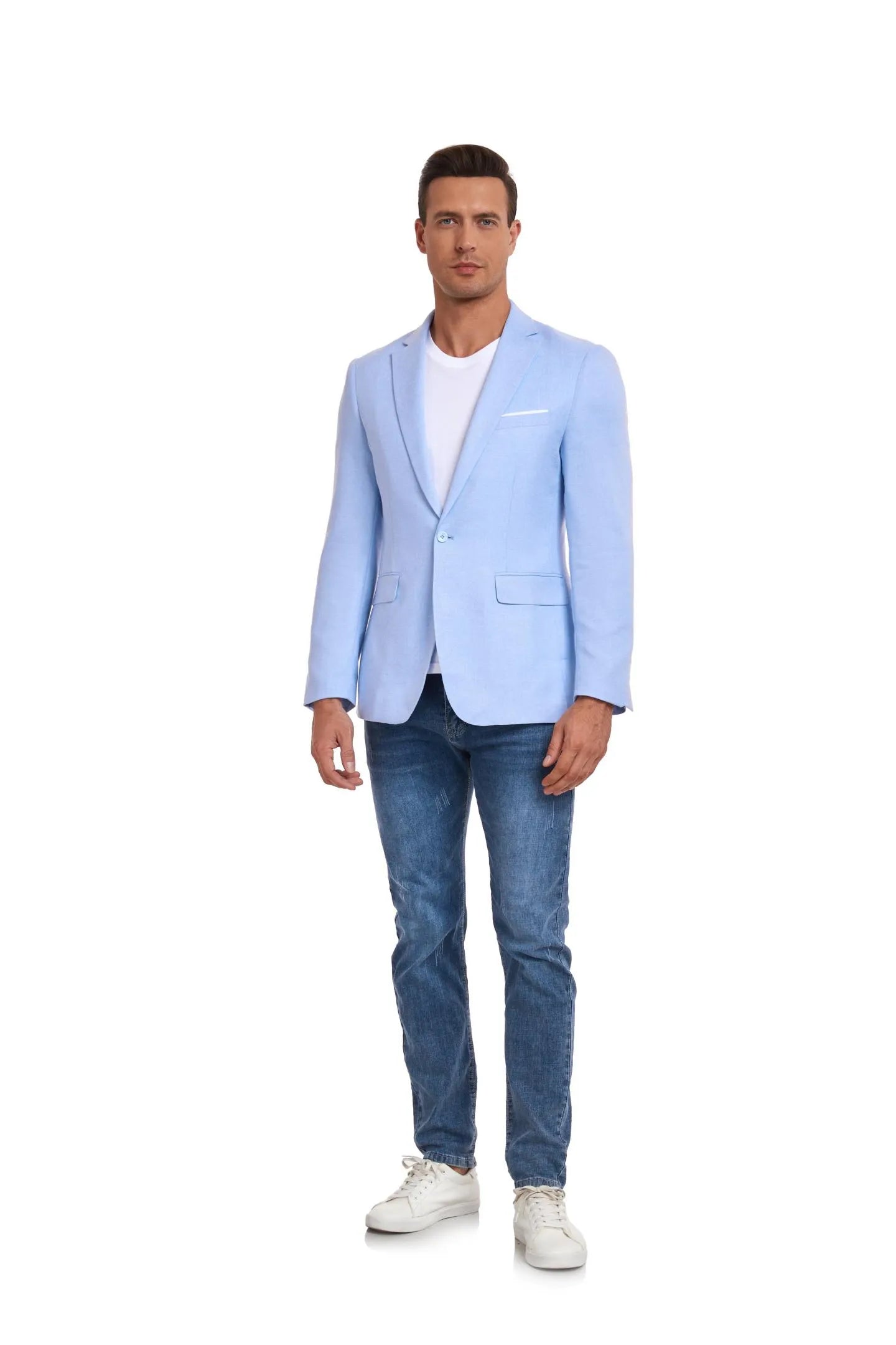 model in blue two-button blazer with white t-shirt and jeans, confidently walking – stylish for business or casual events.