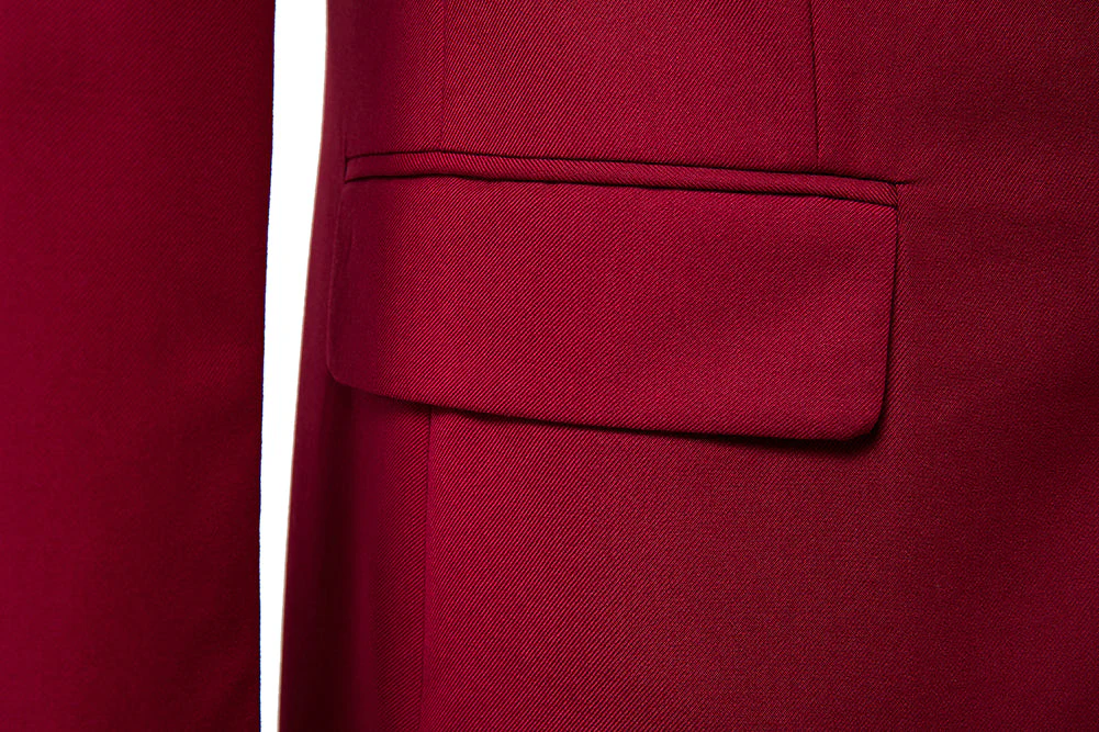 Men's burgundy two button blazer - closeup of flap pocket with textured fabric detail