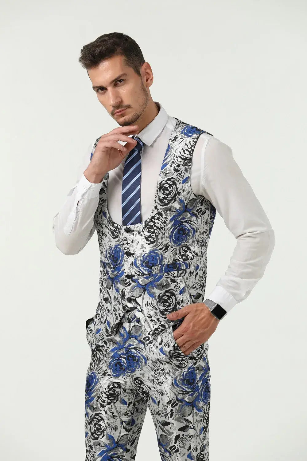Close-up of blue floral suit vest and trousers – unique patterned formalwear look