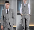 Load image into Gallery viewer, model wearing grey double-breasted 3 piece suit – includes tailored blazer, double-breasted vest, and slim trousers for men's classic attire
