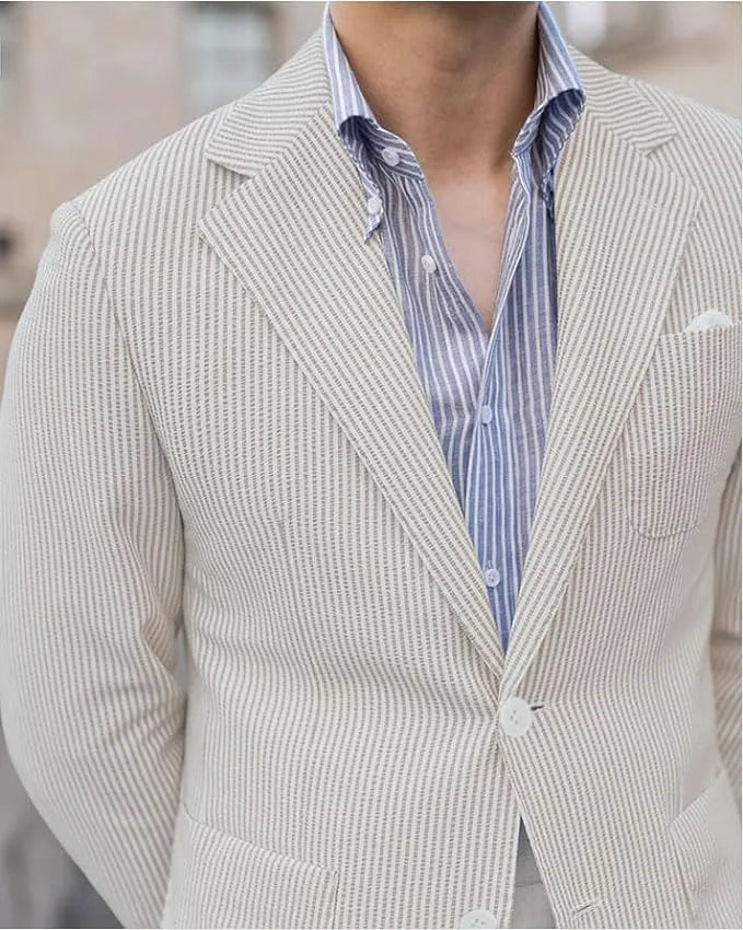Close-up of khaki men's seersucker blazer – lightweight fabric and tailored notch lapel