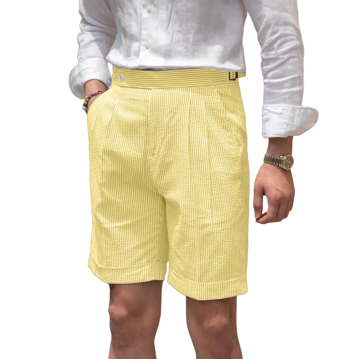 angled view of men's yellow striped seersucker shorts showing expandable waistband and casual summer fit design