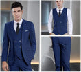 Load image into Gallery viewer, model wearing navy double-breasted vest with white shirt and tie, paired with matching slim trousers for business or wedding style
