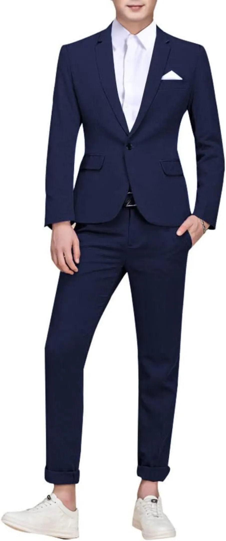 model wearing a navy single-breasted one button suit, paired with a white shirt and sneakers for a modern, polished casual look.