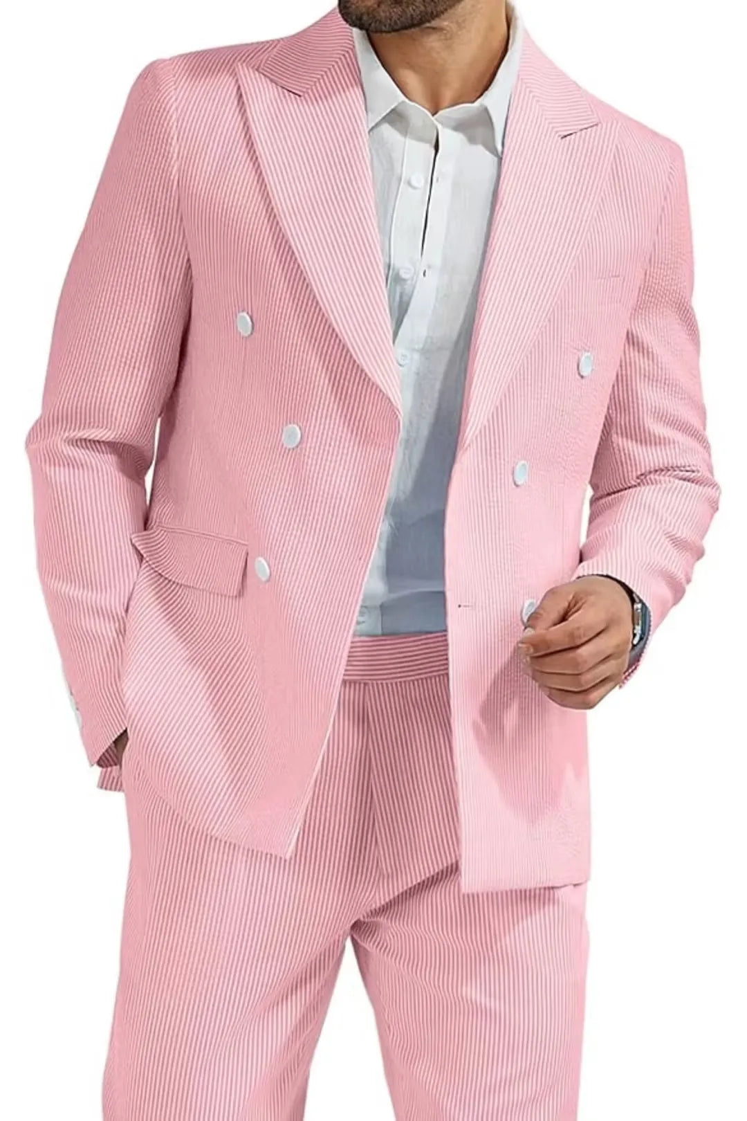 close-up of men's pink double-breasted seersucker blazer with white buttons and classic stripe pattern, paired with a white shirt.