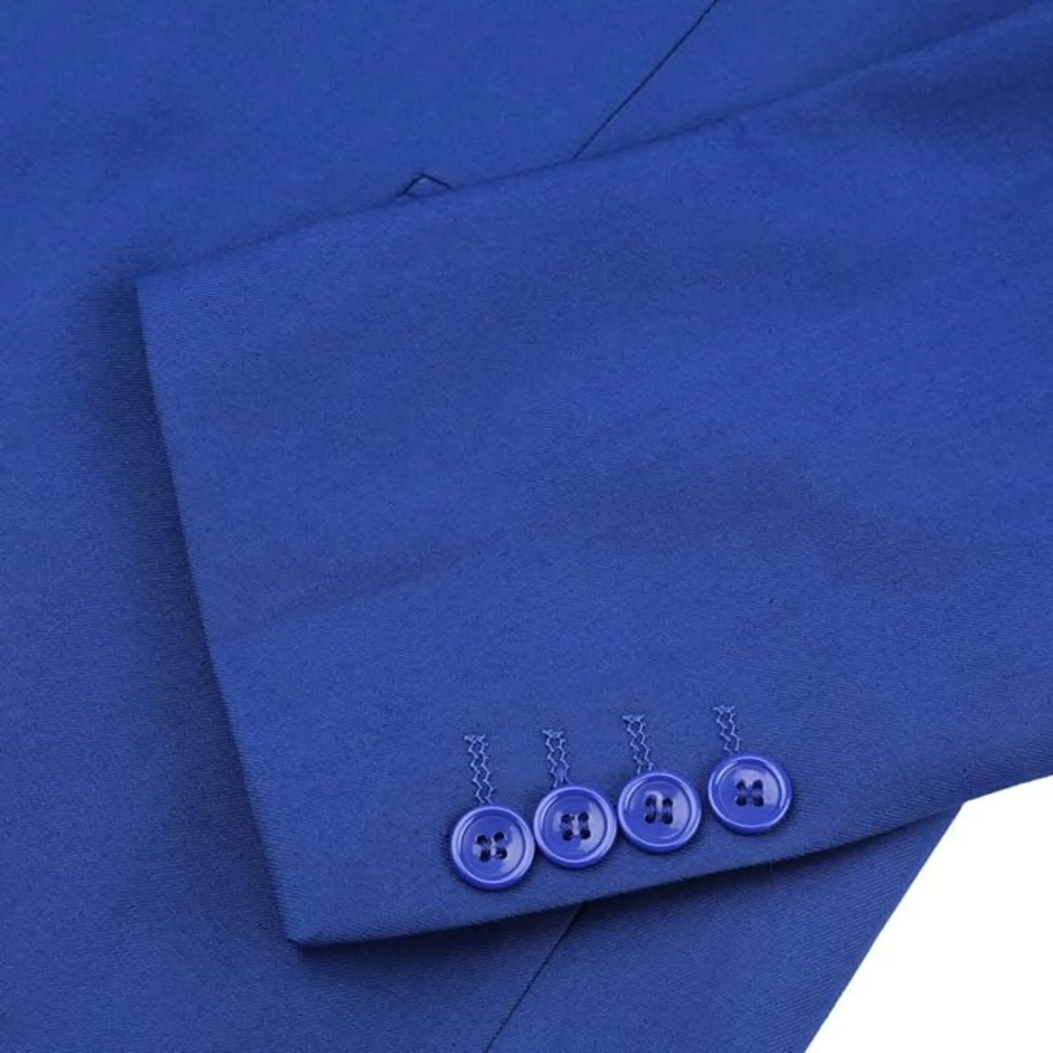 close-up of royal blue men's suit sleeve with button detailing, showcasing sleek design and attention to detail.