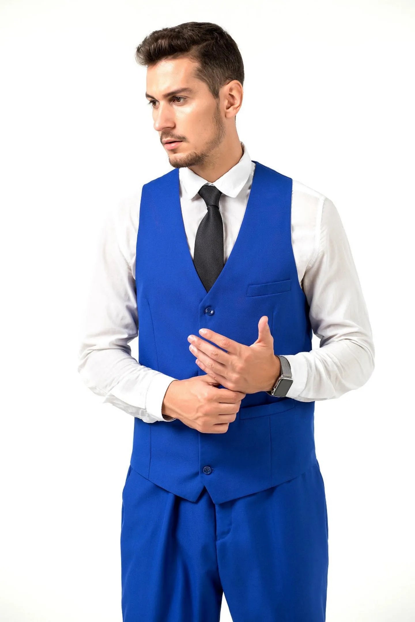 side view of model in royal blue slim-fit vest with black tie, highlighting the sleek and modern look of the suit.