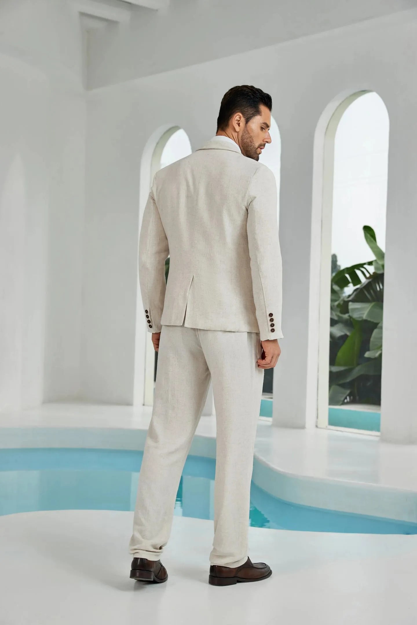 back view of beige linen 3 piece suit for men – tailored blazer and trousers with slim fit summer wedding design