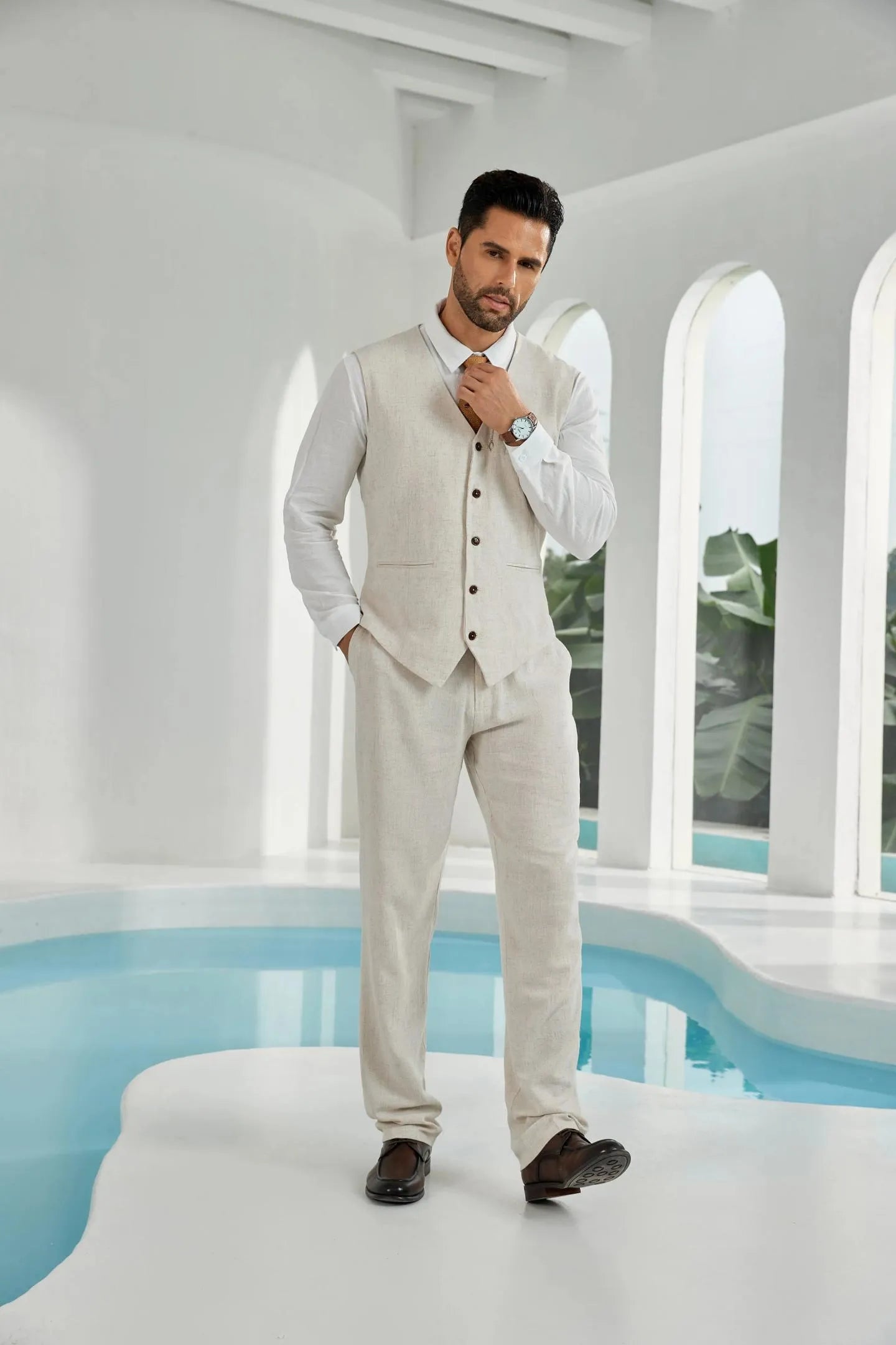 front view of beige linen suit for men – 2 piece summer wedding outfit with vest and pants, styled with white shirt